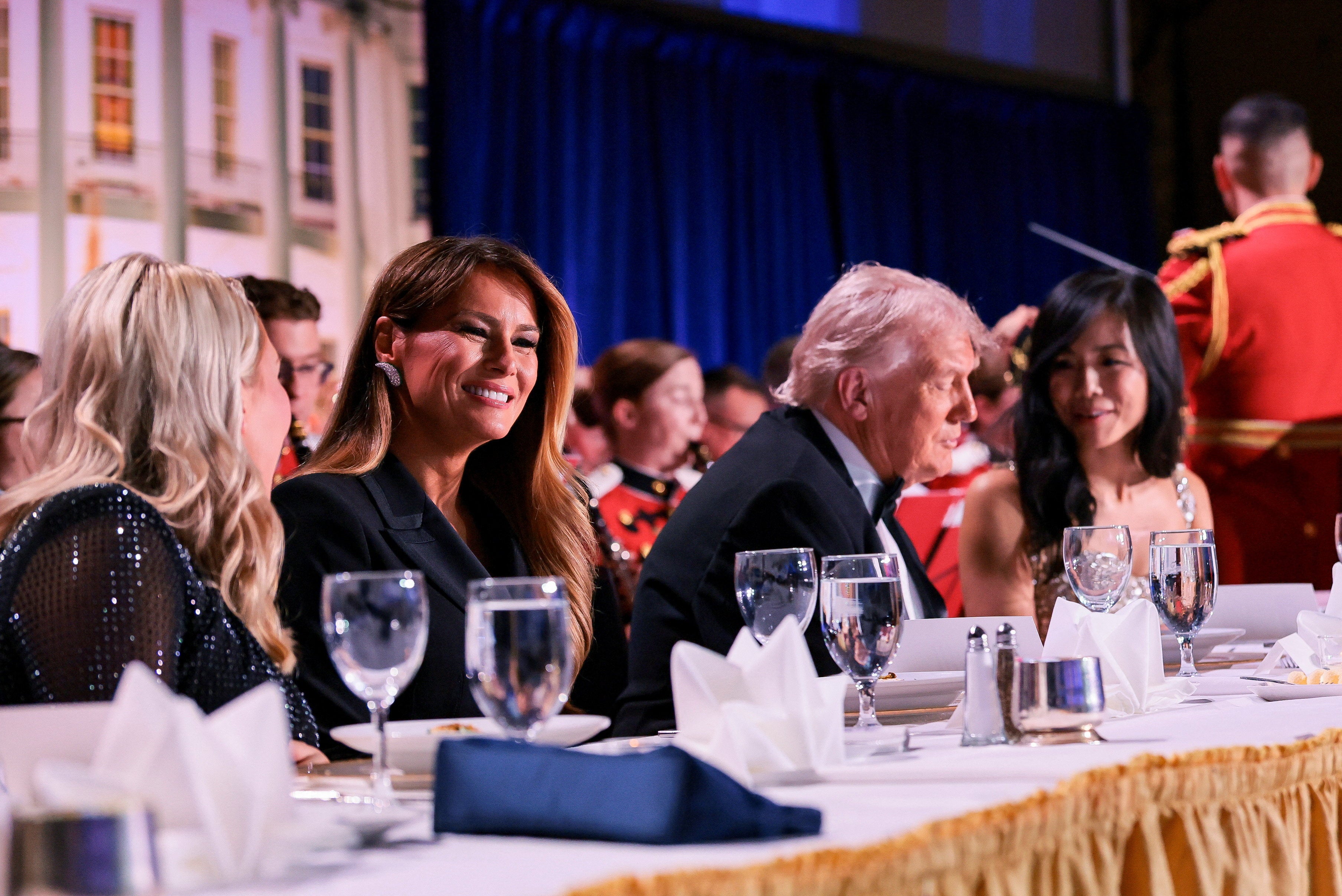 The president and first lady at the dinner before the incident