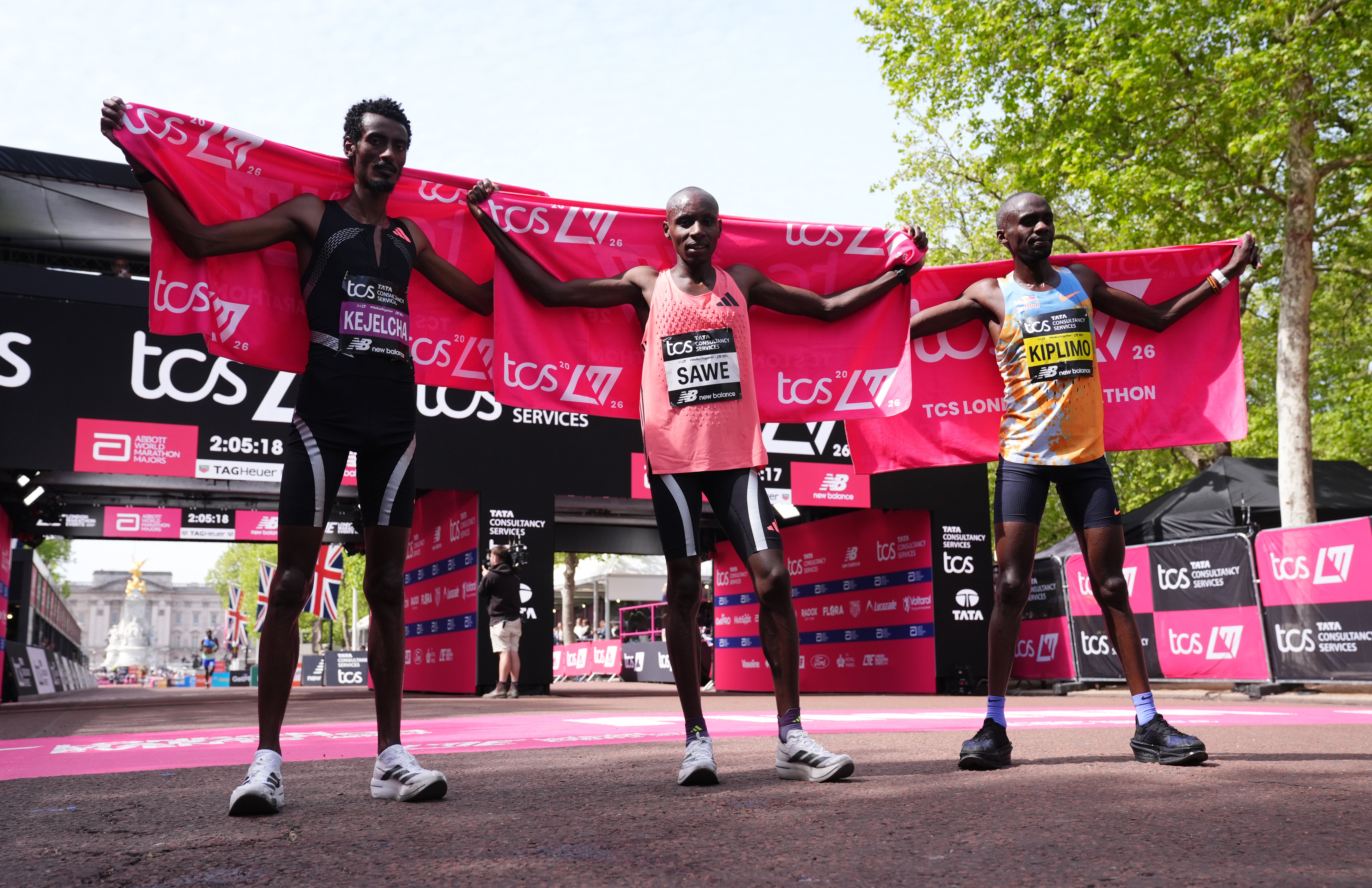 Sabastian Sawe (centre), Yomif Kejelcha (left) and Jacob Kiplimo (right) all ran under the previous world record