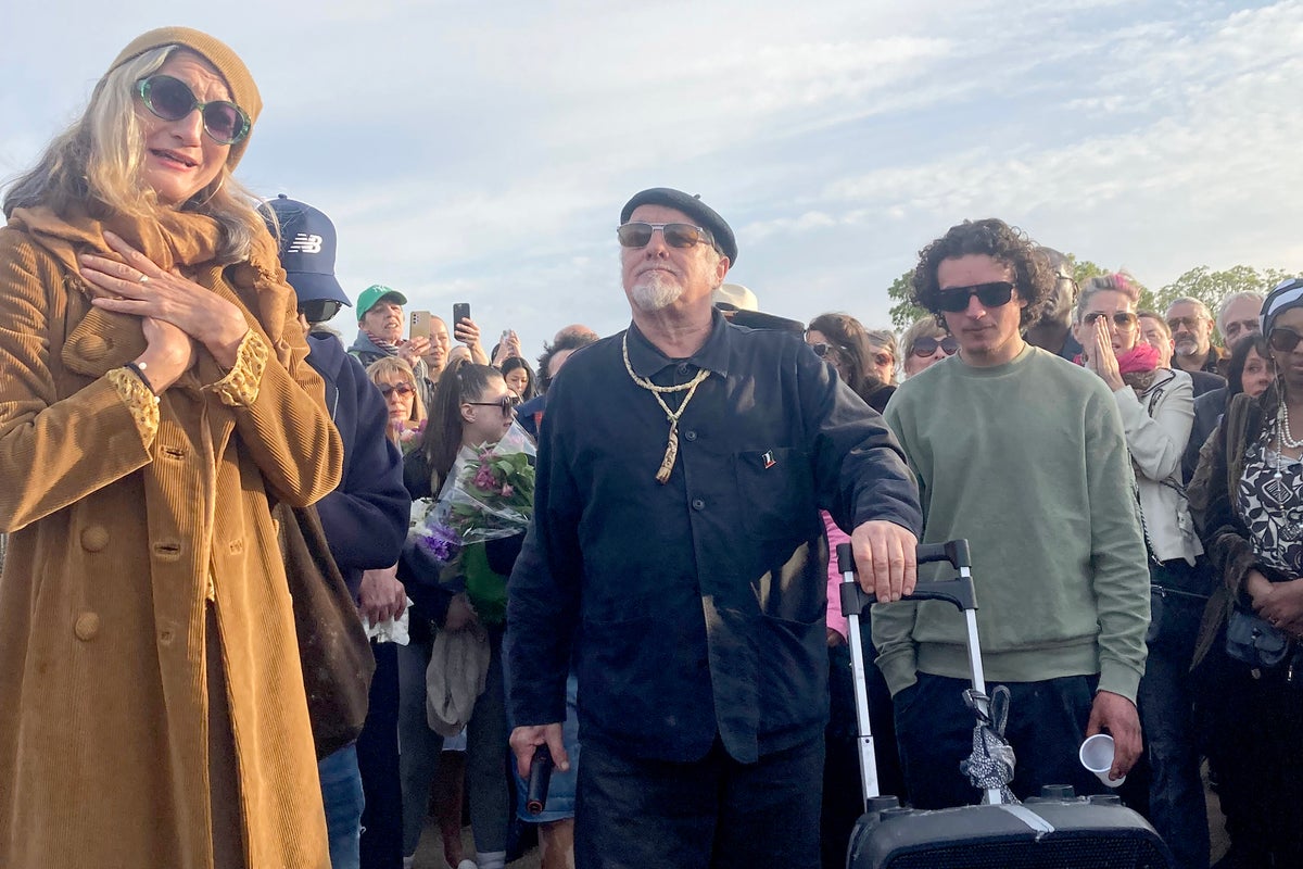 Madness star leads tributes at vigil for stabbed student Finbar Sullivan