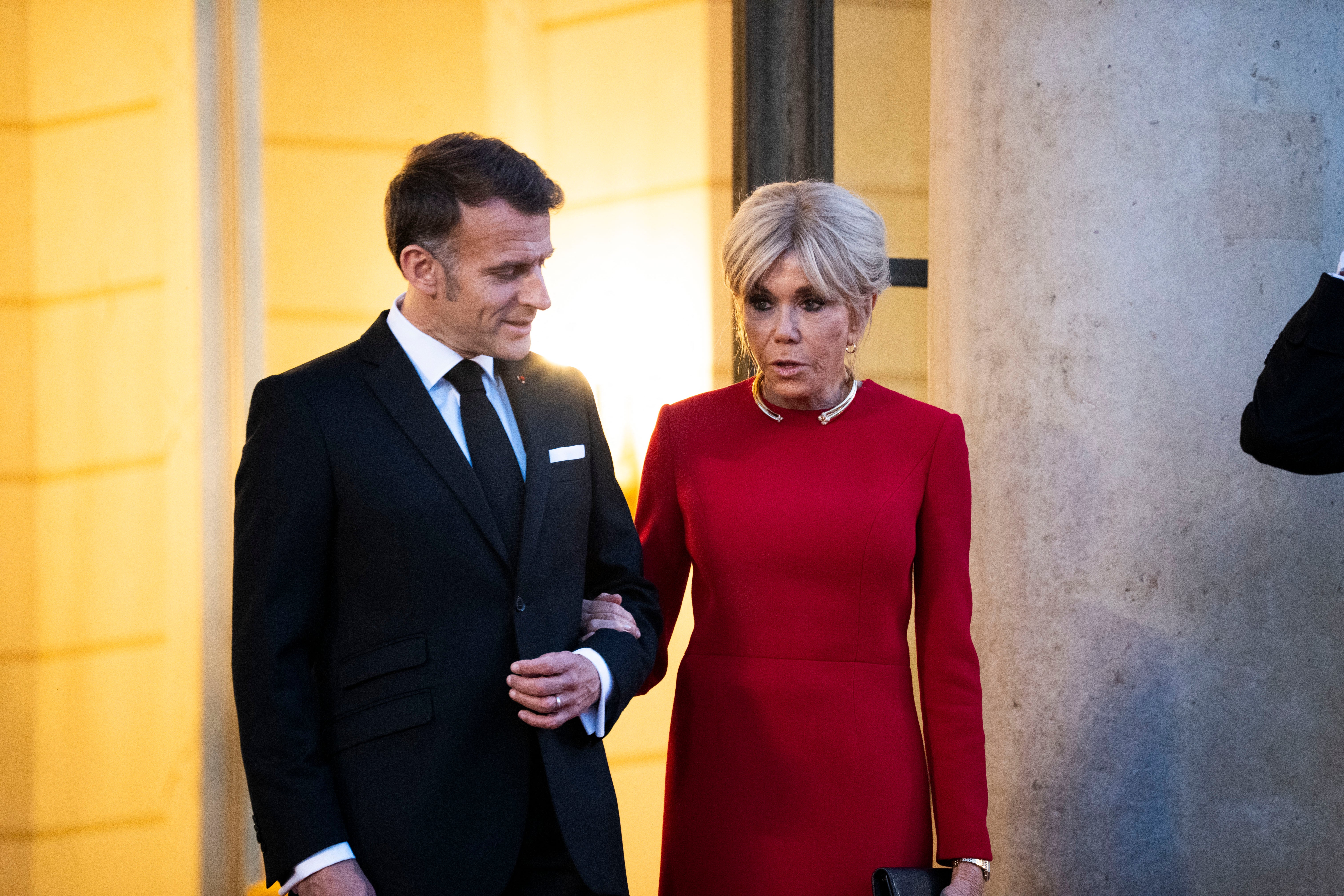 First lady Brigitte Macron, right, has faced intense scrutiny during her husband's time leading France