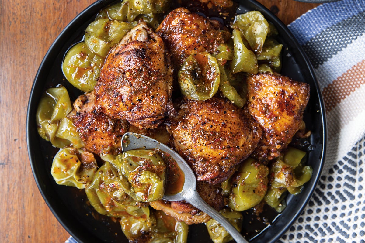 A tangy dressing flavors this recipe for Mex-Italian Chicken Thighs with Roasted Tomatillos