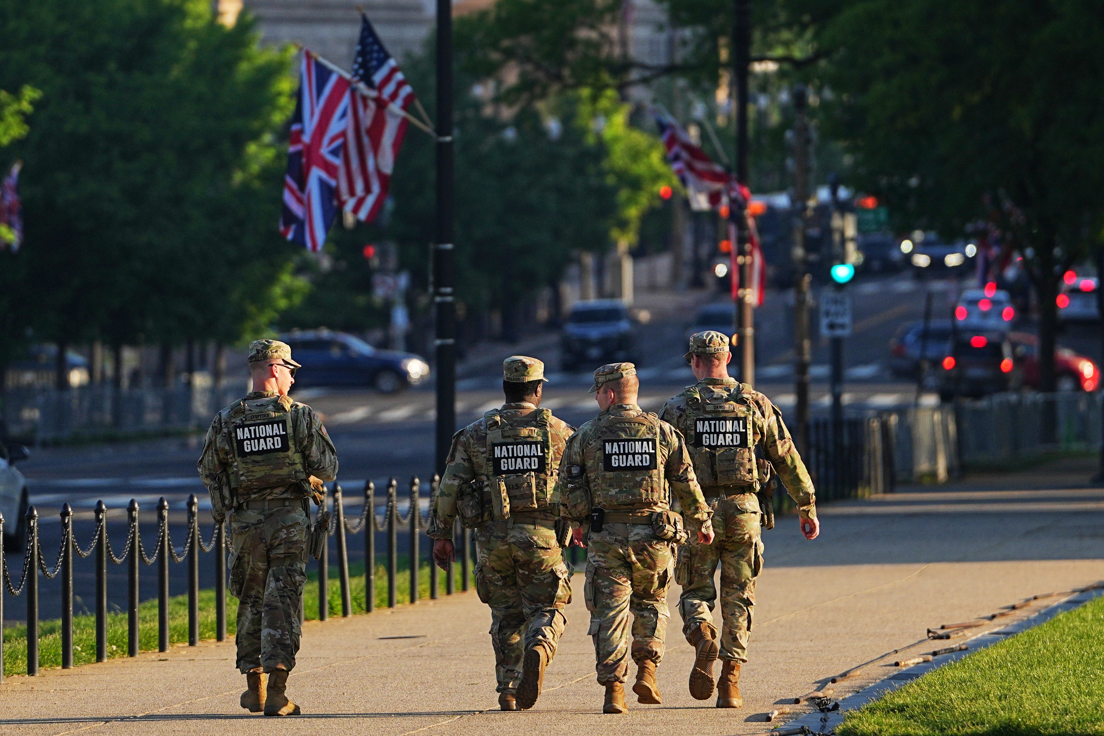Members of the National Guard patrol the National Mall, Monday, April 27, 2026, in Washington. King Charles III and Queen Camilla arrive in the U.S. today for a four-day state visit aimed at celebrating the United States' 250th anniversary, including a White House state dinner and a speech to Congress. (AP Photo/Matt Rourke)