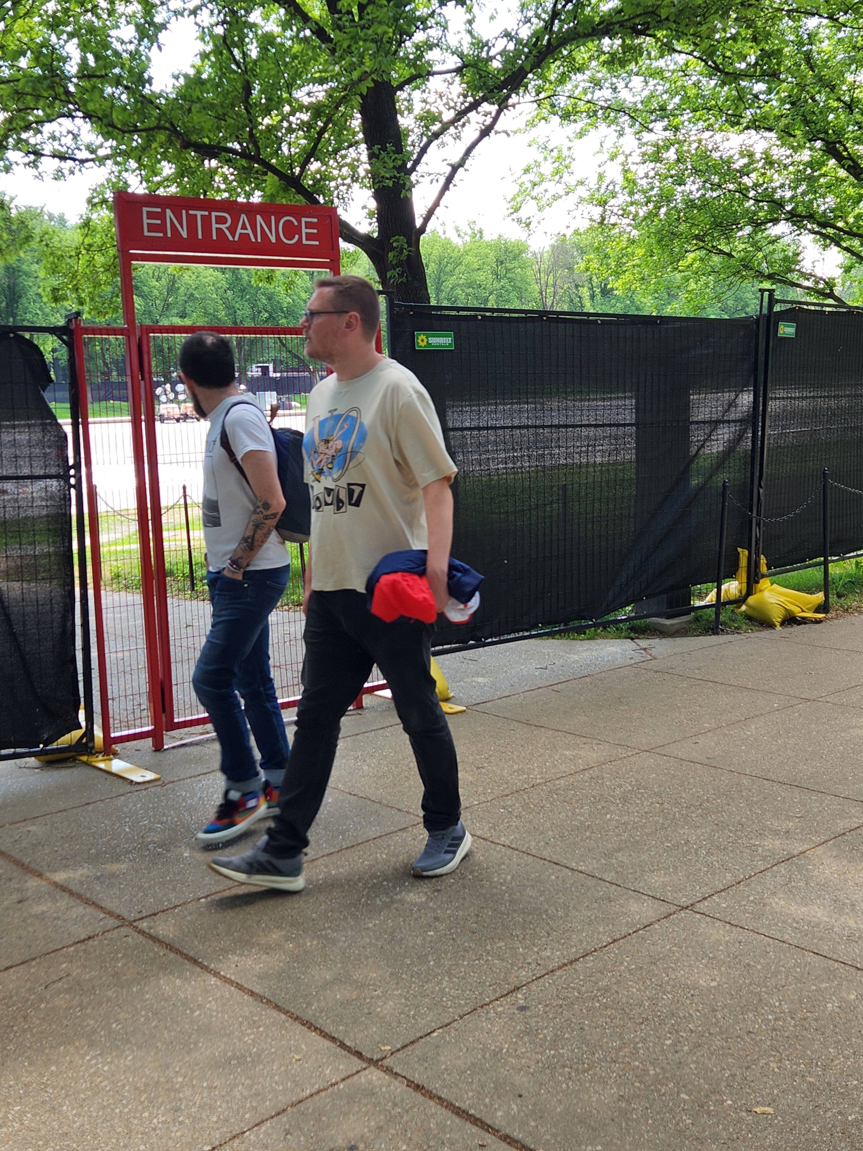 A man peers into the fenced-off entrance to the construction at the Lincoln Memorial's Reflecting Pool