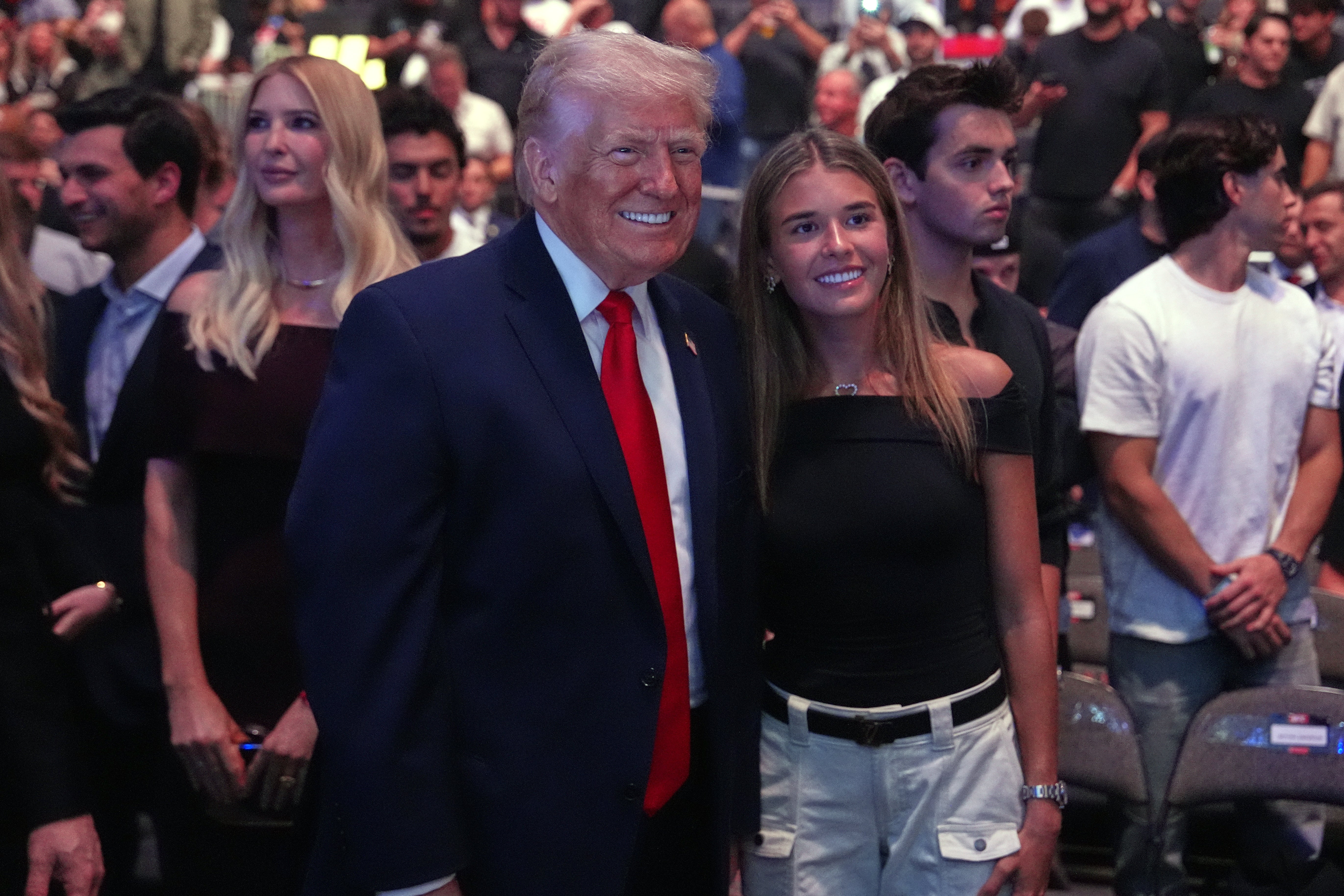 U.S. President Donald Trump poses for photos with Kai Trump during UFC 327 at Kaseya Center on April 11, 2026 in Miami, Florida.