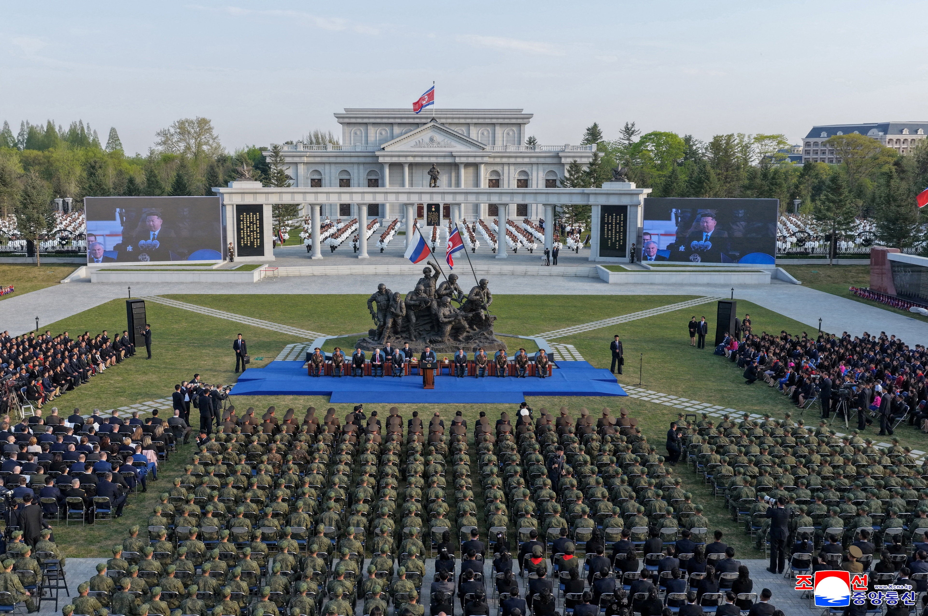 North Korean leader Kim Jong Un speaks during the opening ceremony of the Memorial Museum of Combat Feats