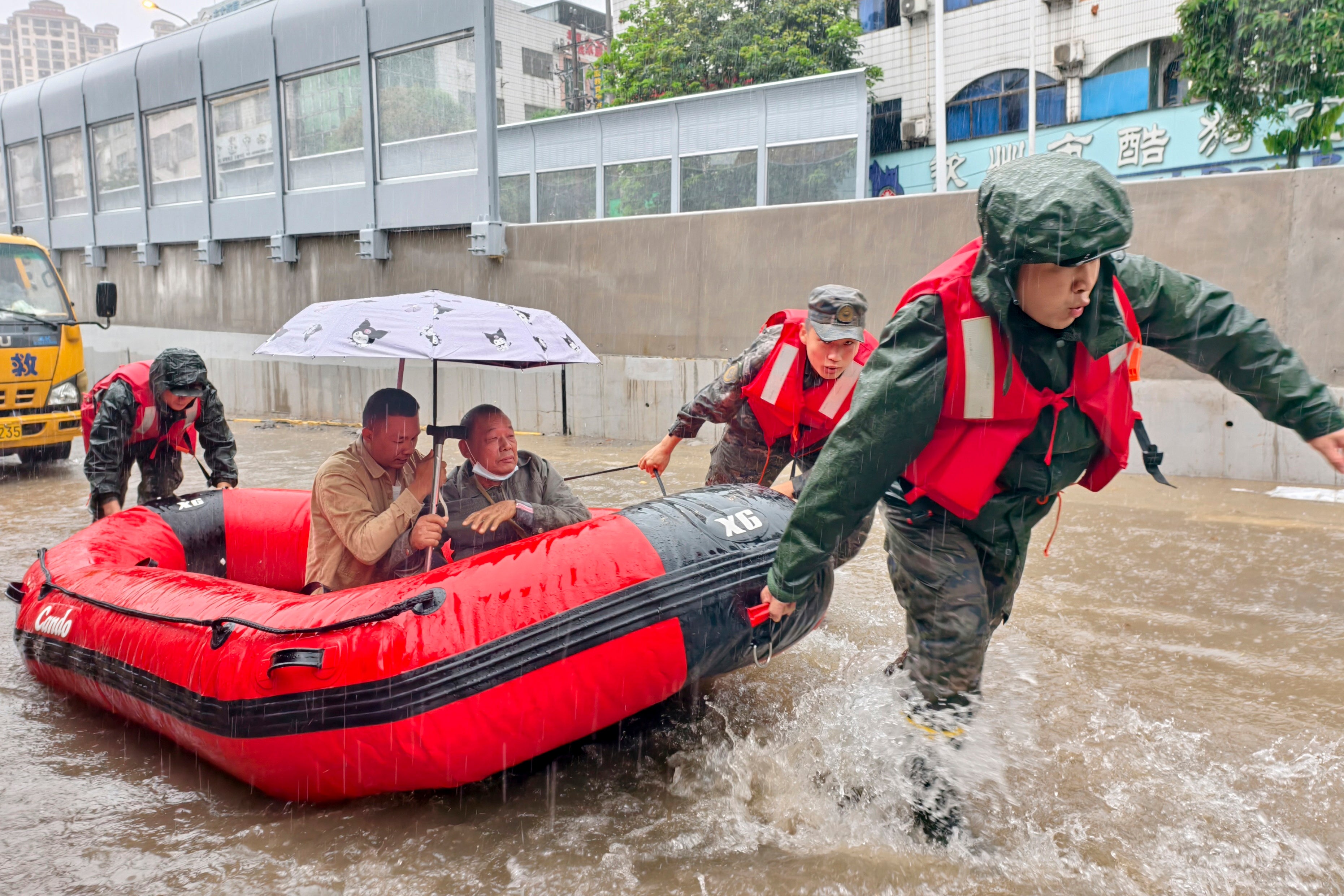 <p>Stranded residents are evacuated on a boat after flooding from heavy rainfall in Qinzhou in southern China's Guangxi Zhuang Autonomous Region</p>