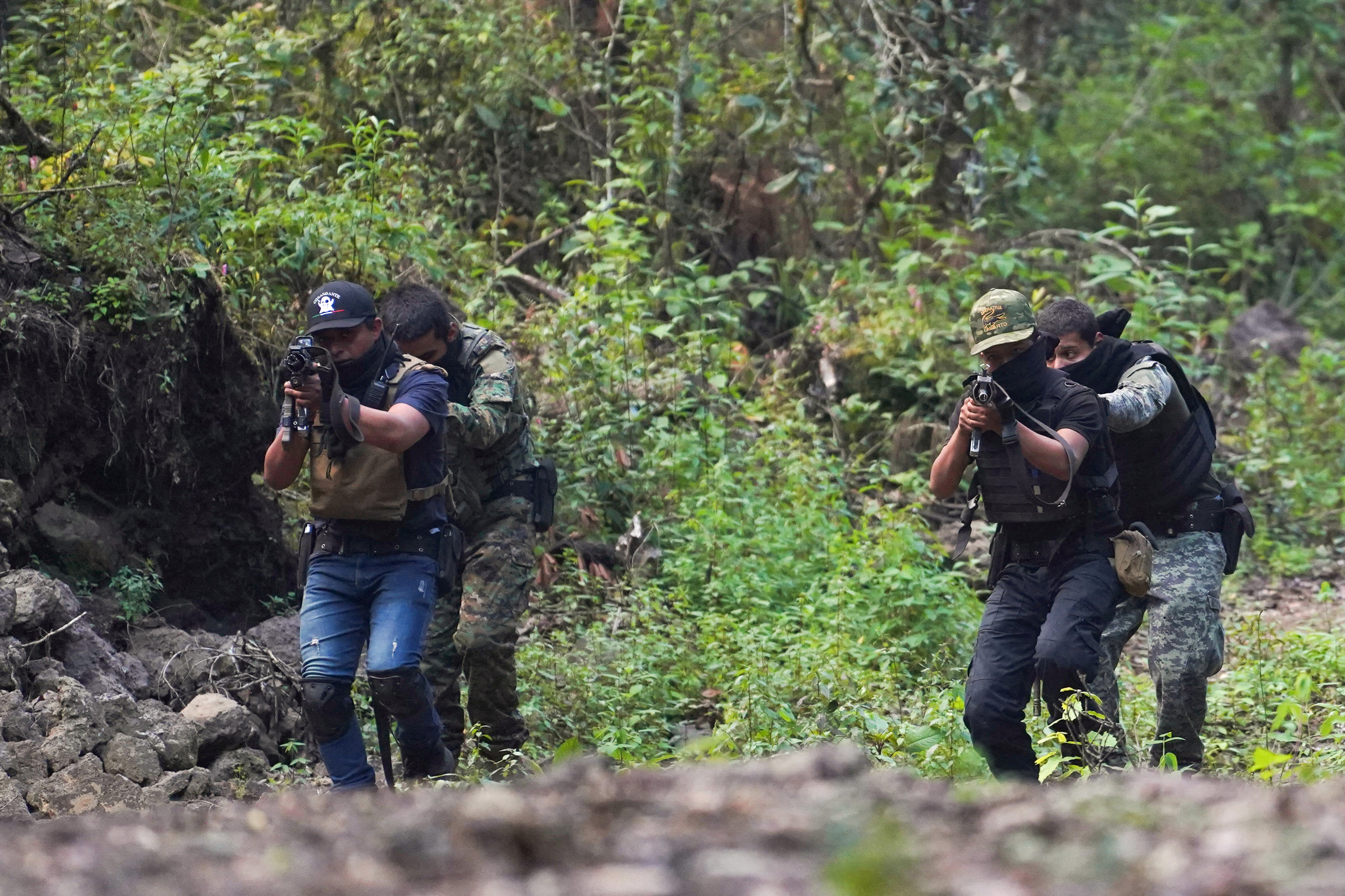 Members of the Jalisco New Generation Cartel (CJNG), led by Nemesio Oseguera, known as “El Mencho,” participate in firearms training at an undisclosed location in Michoacan state