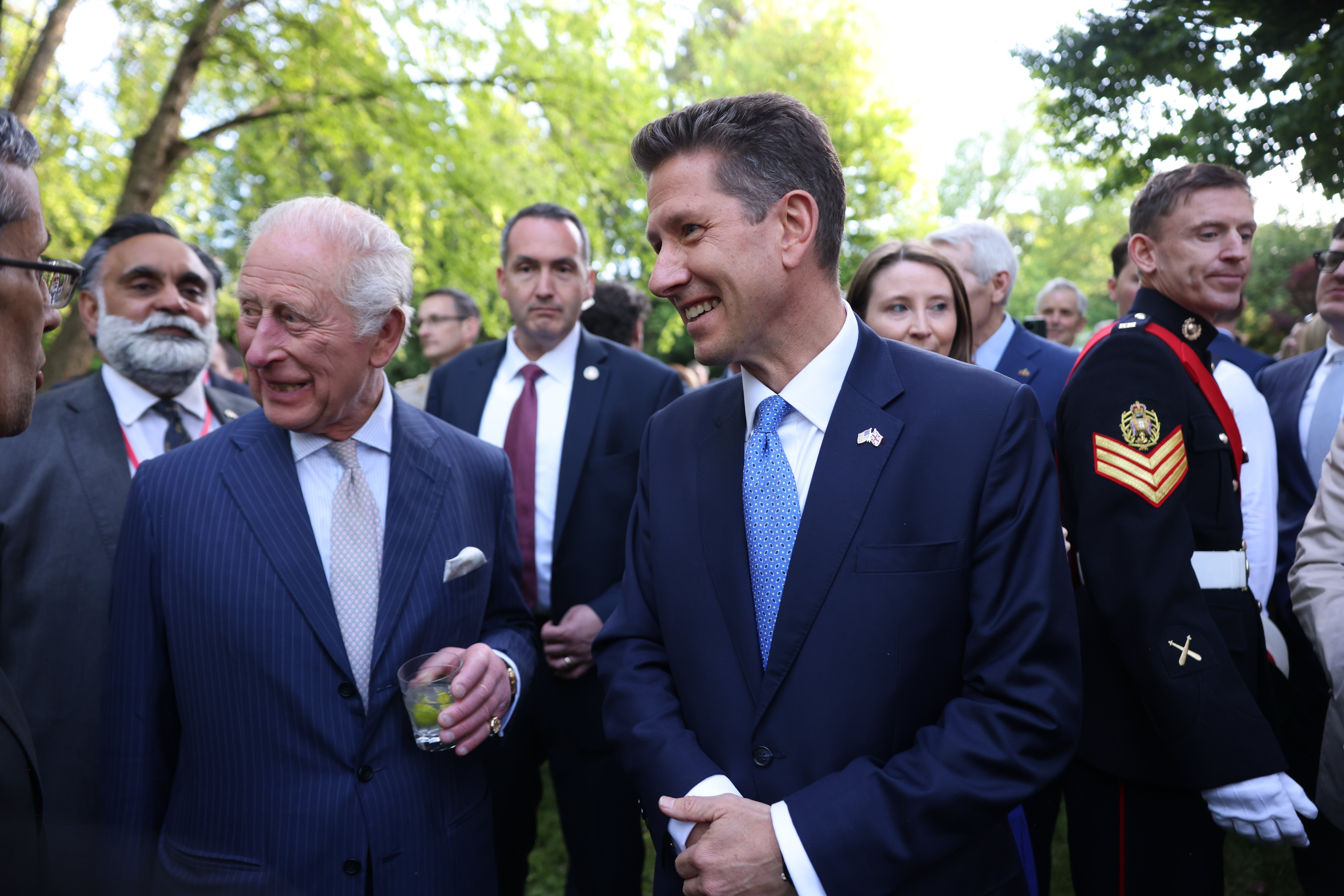King Charles III and Sir Christian Turner, British ambassador to the US attend a Garden Party on day one of his State visit to the United States of America with Queen Camilla