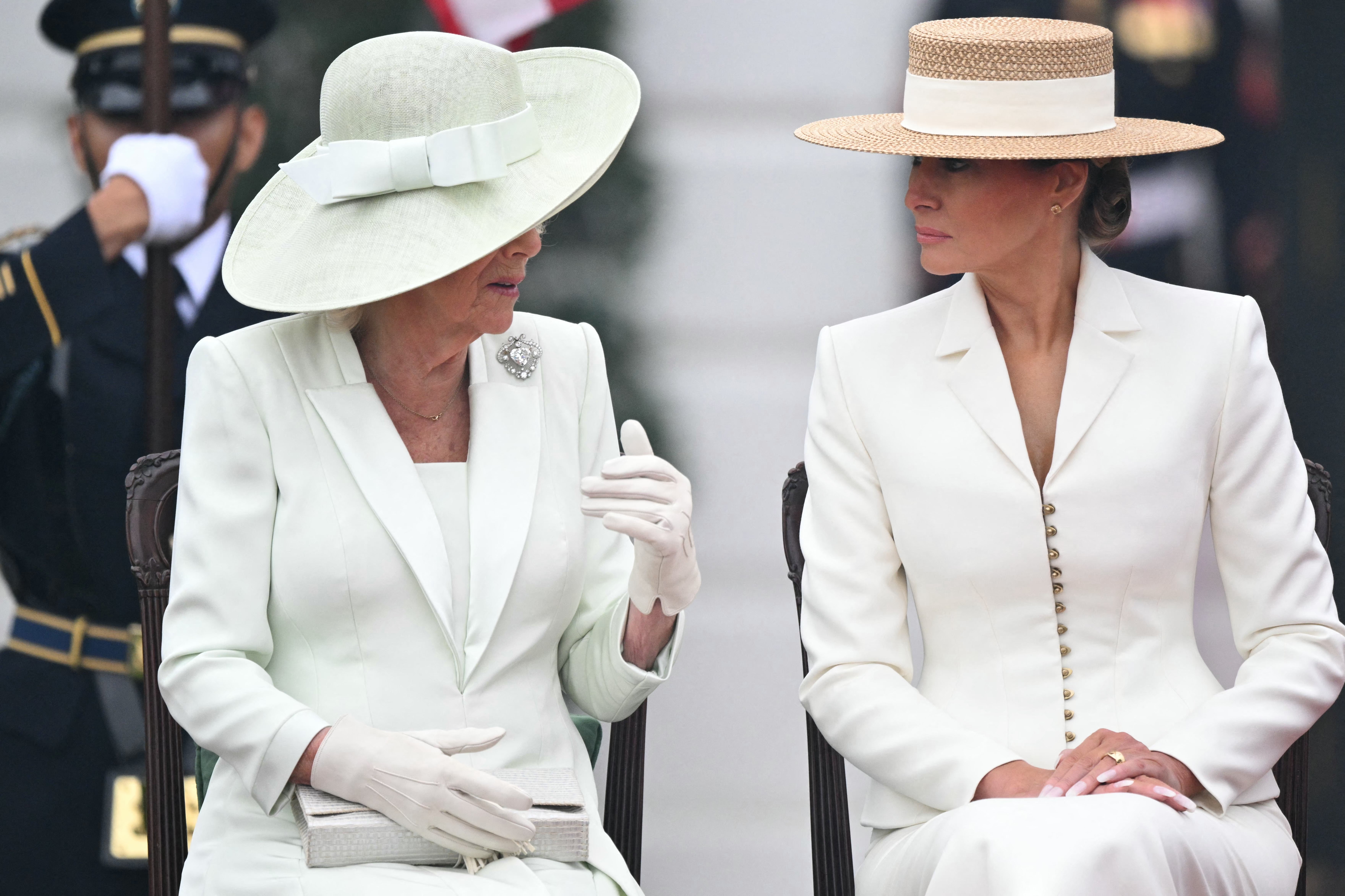 First lady Melania Trump — who is currently engaged in a war of words, and potentially censorship, with late-night host Jimmy Kimmel — speaks with Britain's Queen Camilla during the arrival ceremony on the South Lawn of the White House Tuesday morning.