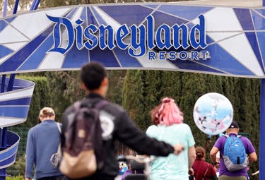 <p>Disneyland will end a COVID-era rule that slowed guests from ‘park hopping,’ or moving between Disneyland Park and California Adventure</p>