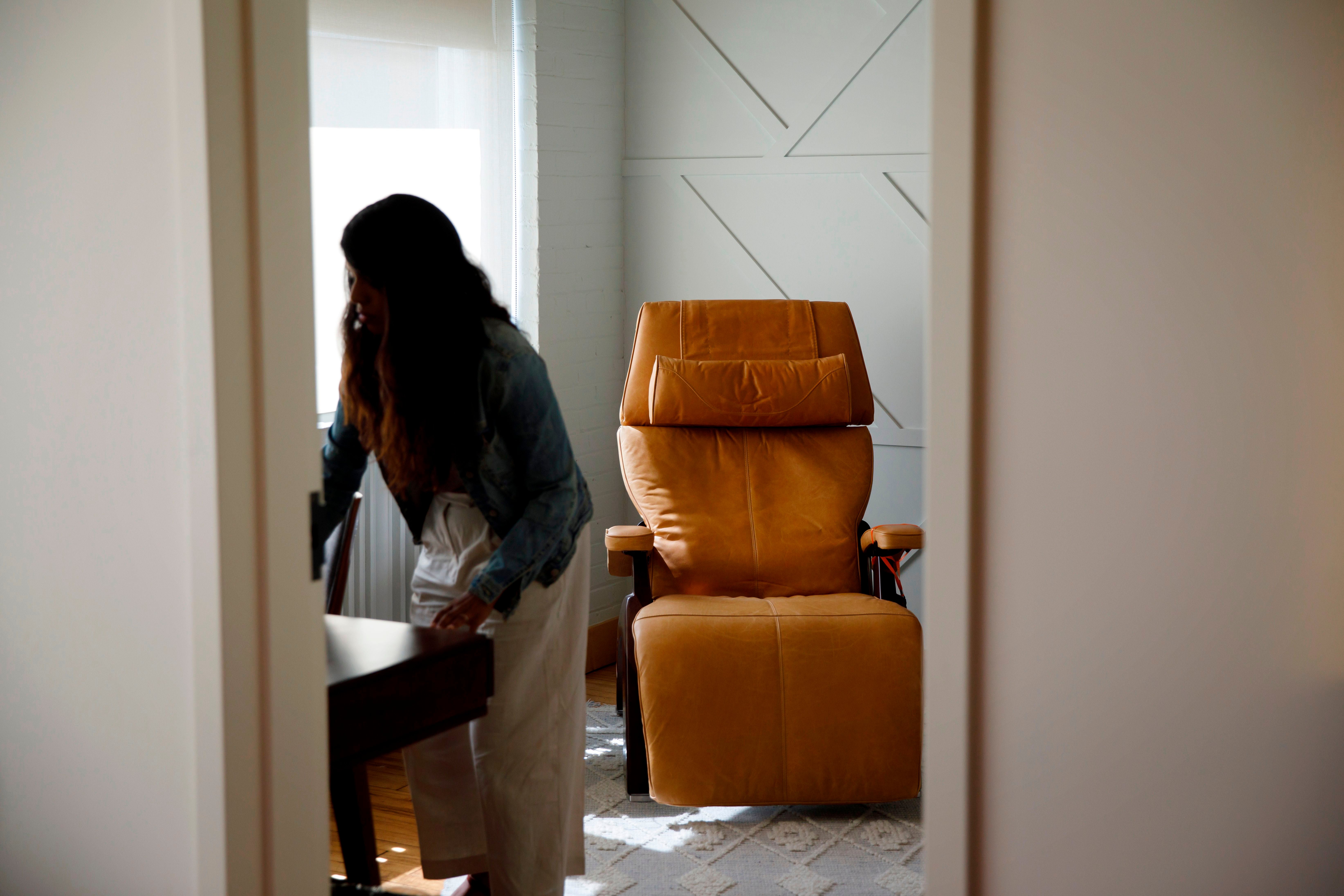 A chair is seen in a therapy room at a psychedelic therapy clinic