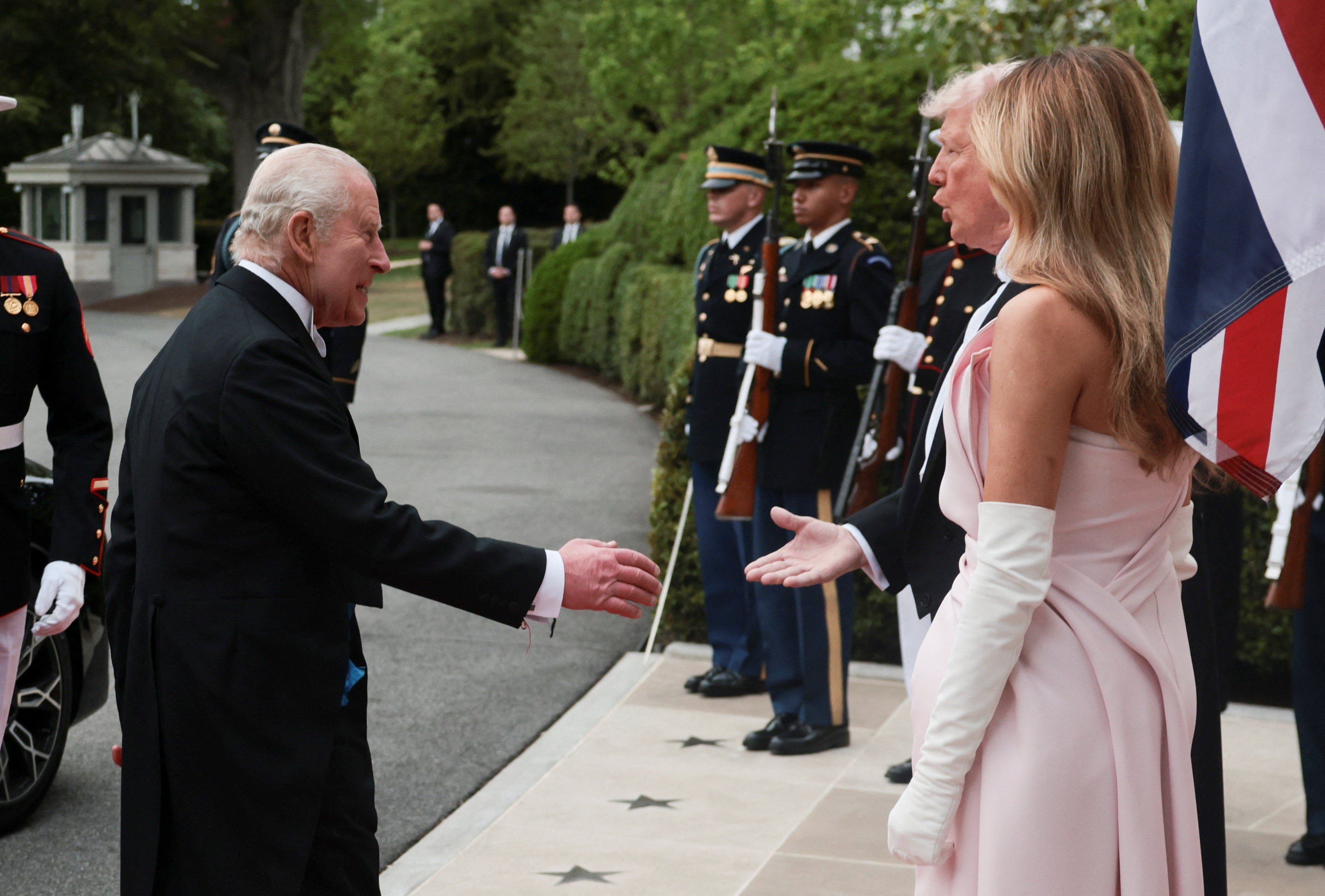 U.S. President Donald Trump and first lady Melania Trump welcome Britain's King Charles and Queen Camilla (not pictured) at the South Portico as they arrive for a state dinner at the White House in Washington, D.C.