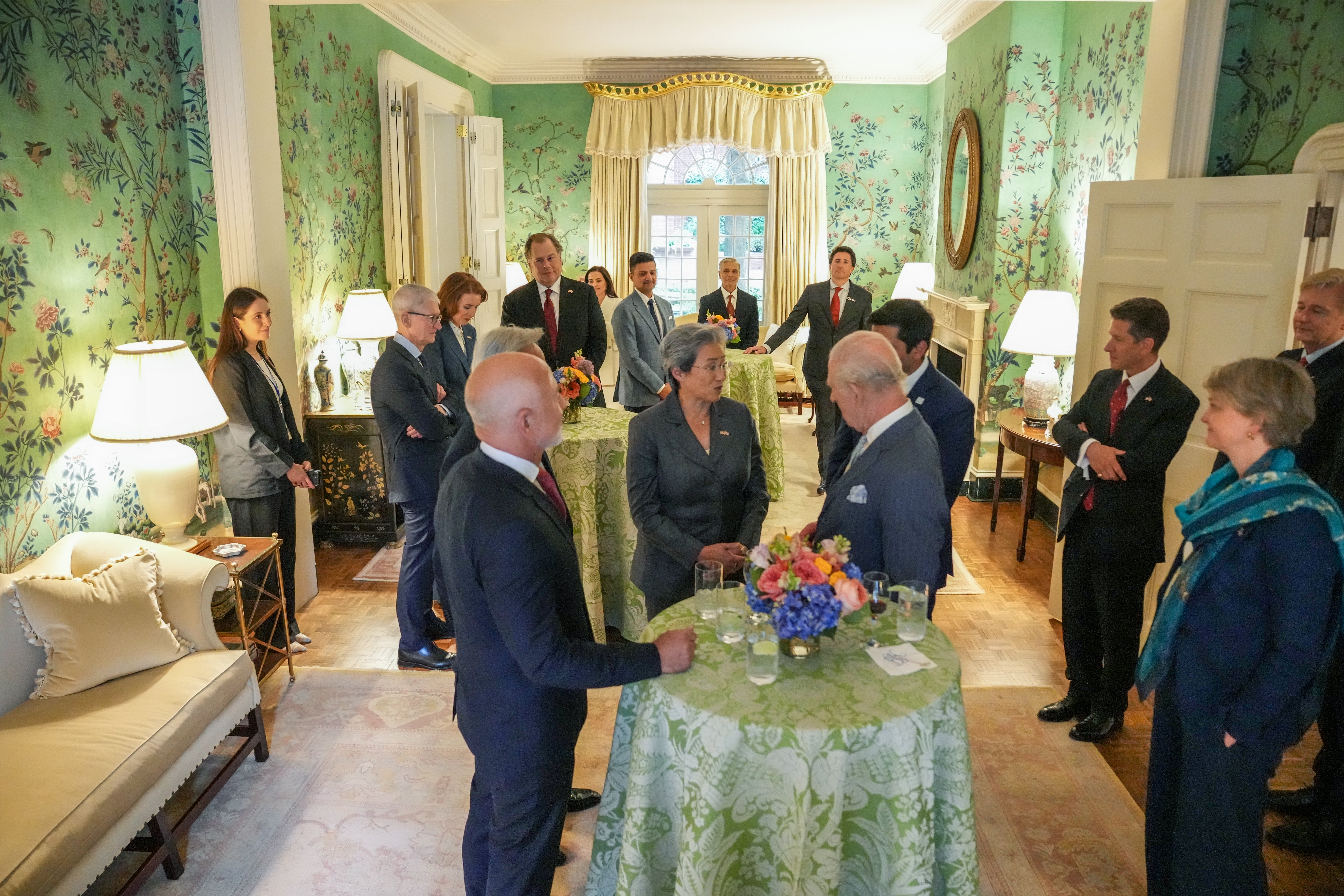Britain's King Charles III speaks with Nvidia CEO Jensen Huang, Amazon founder Jeff Bezos and AMD President Lisa Su during a meeting with chief executives from the technology industry at Blair House on day two of the State Visit of King Charles III and Queen Camilla