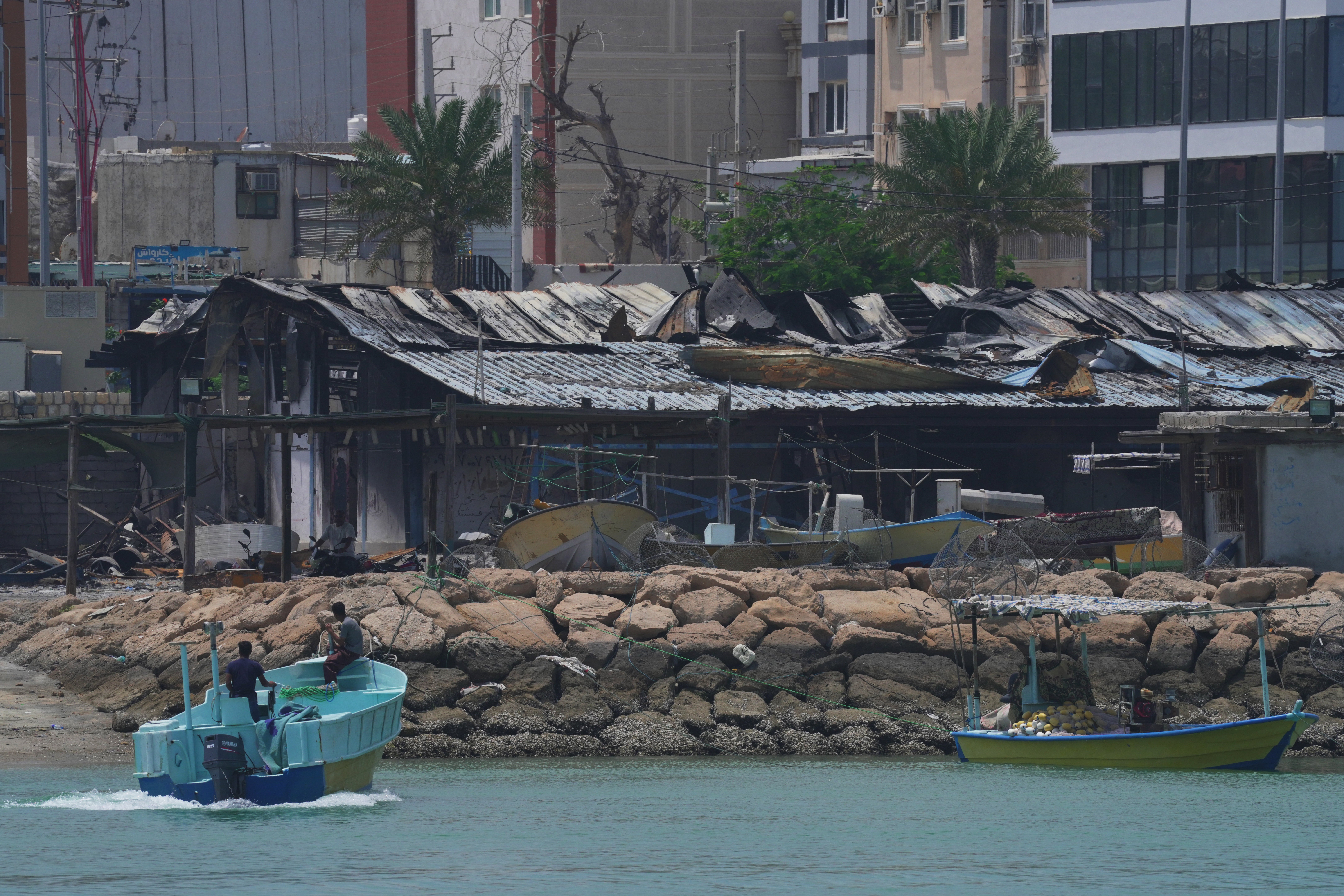 A boat navigates near the shoreline on 28 April 2026 on Qeshm Island, Iran in the Strait of Hormuz