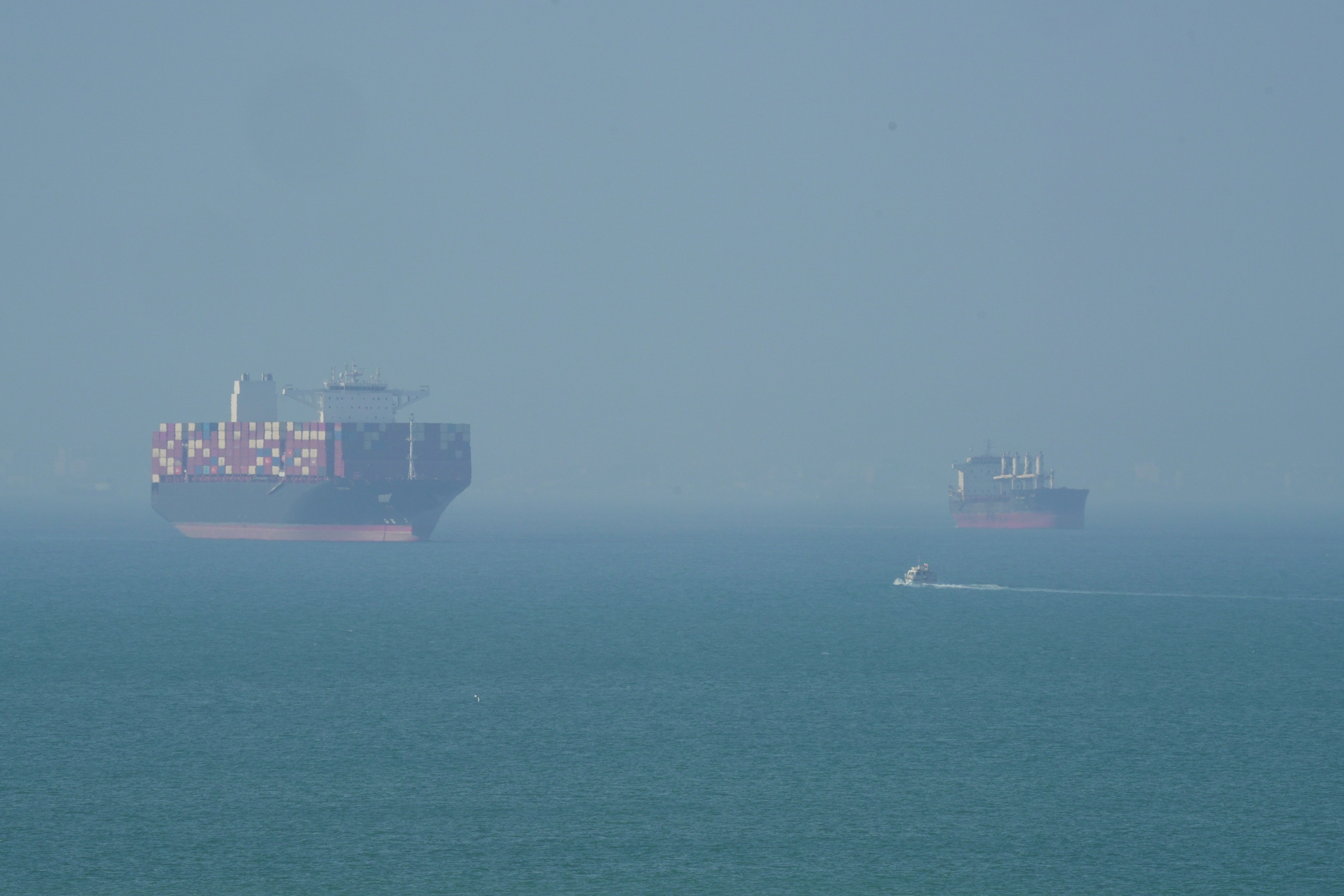 A cargo ship navigates the sea near Qeshm Island in the Strait of Hormuz, as the prospect of a peace deal between the U.S. and Iran looks no closer to realization