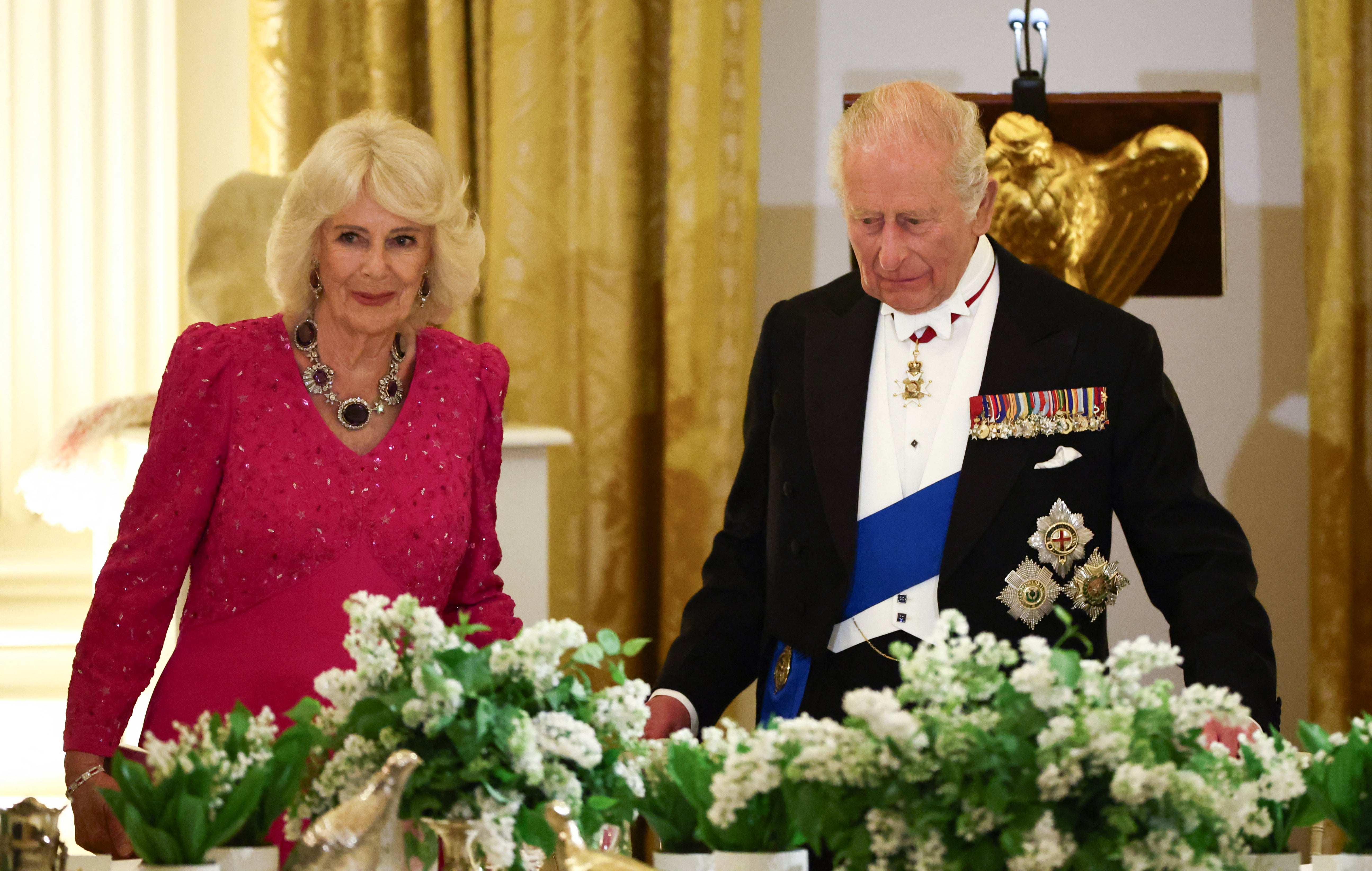 Britain's King Charles III and Queen Camilla attend a State Dinner in the East Room of the White House.