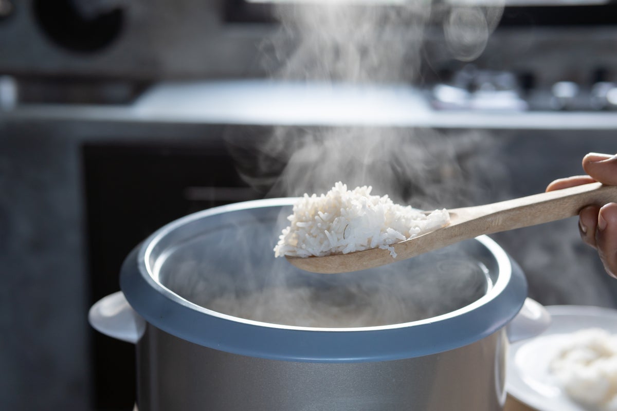 University cleaner awarded &pound;264k compensation after being sacked over rice cooker dispute