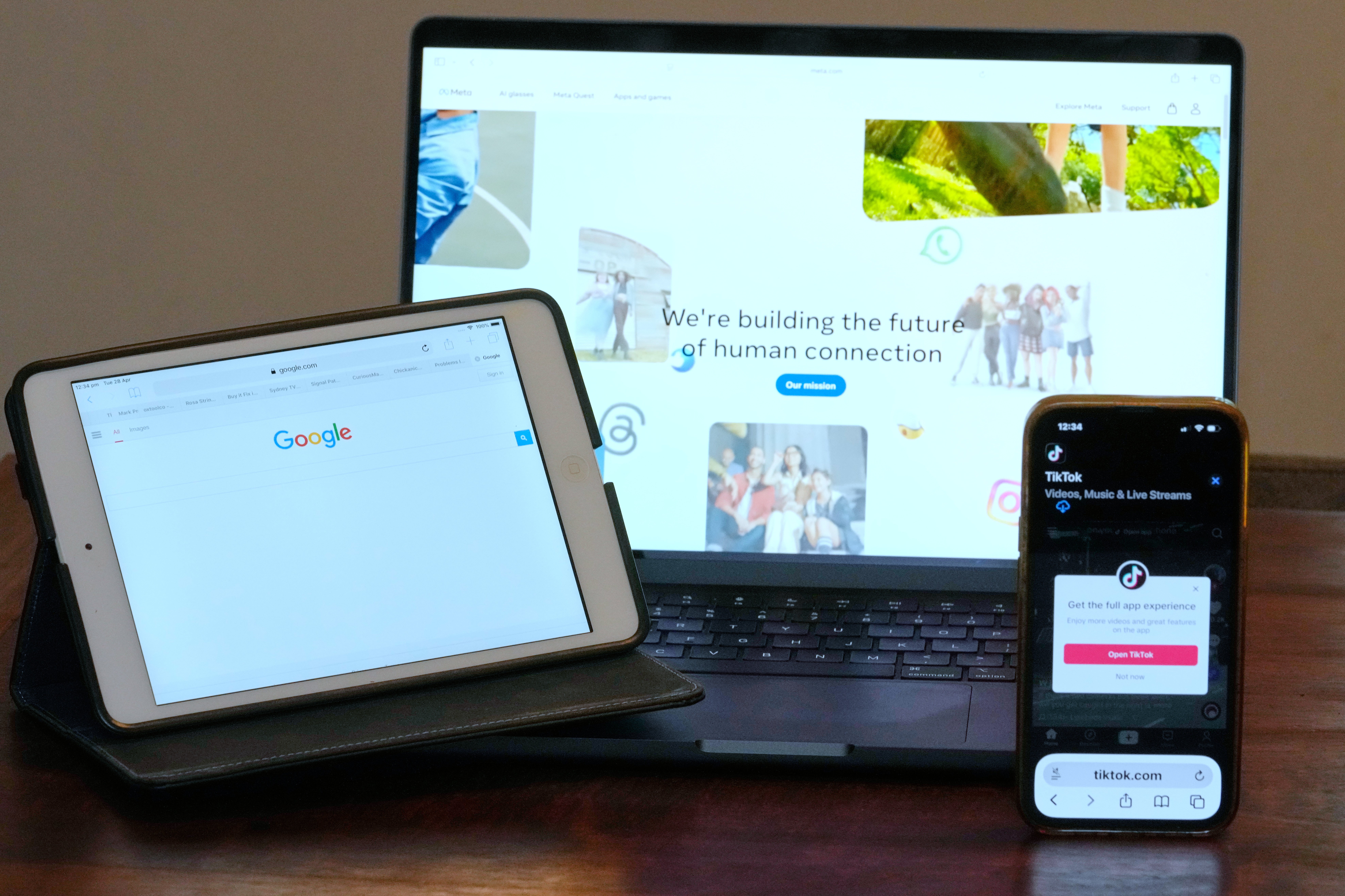 The home pages of Meta, Google and TikTok are displayed on devices in Sydney,