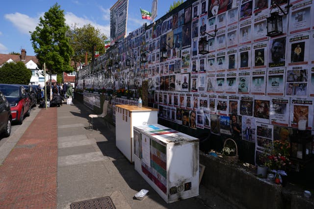 Fire damage to a cabinet beside the memorial wall on Limes Avenue in Golders Green