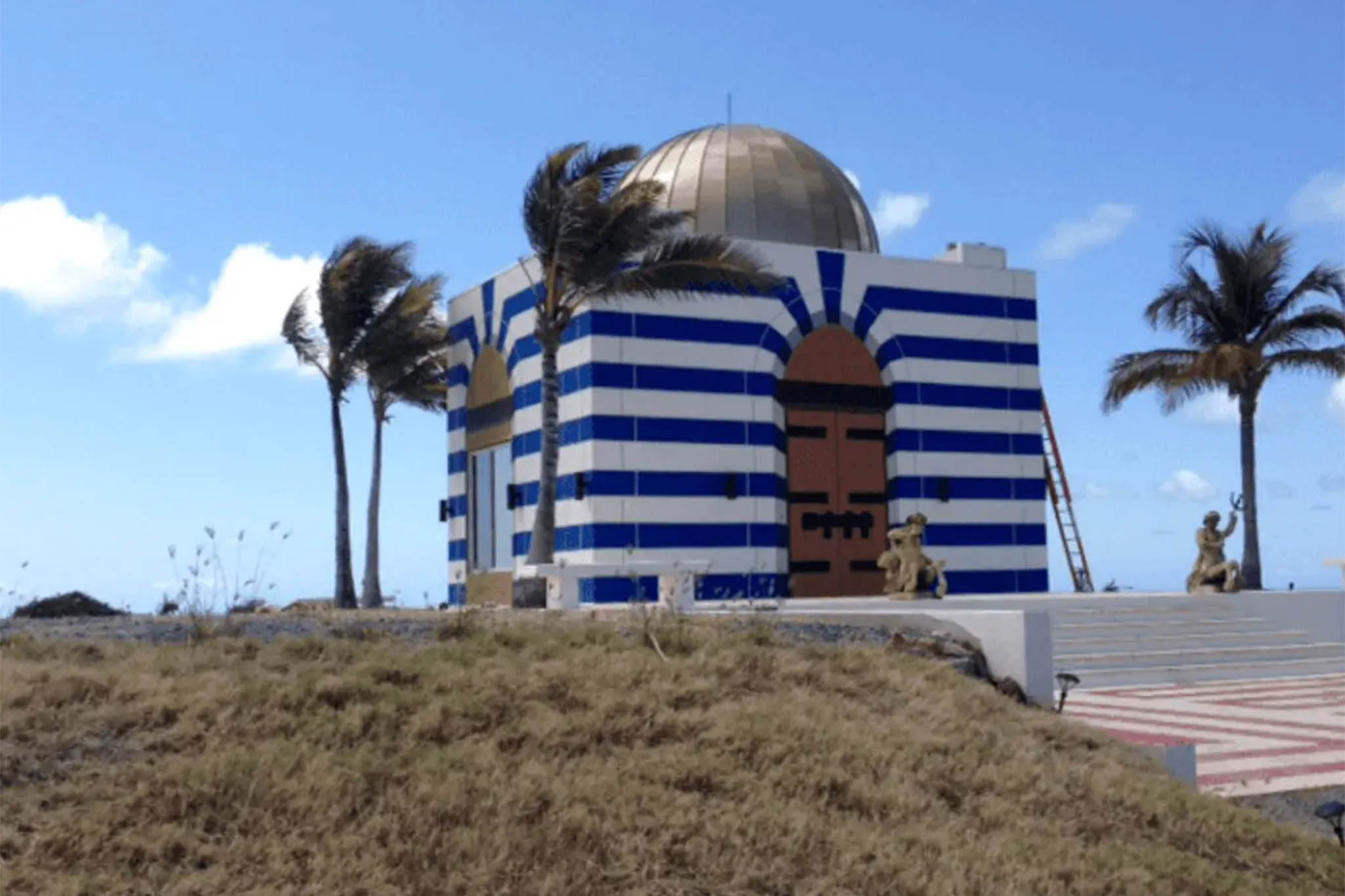 Epstein documents reveal purpose of strange striped building on his Caribbean island