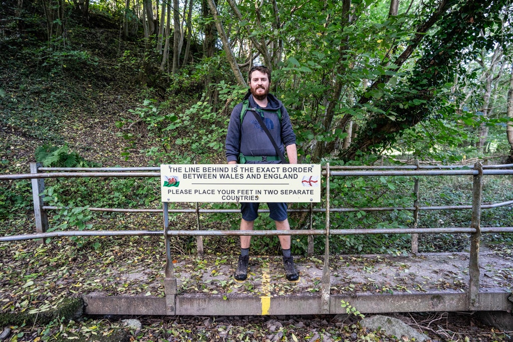 Richard standing on the English and Welsh border