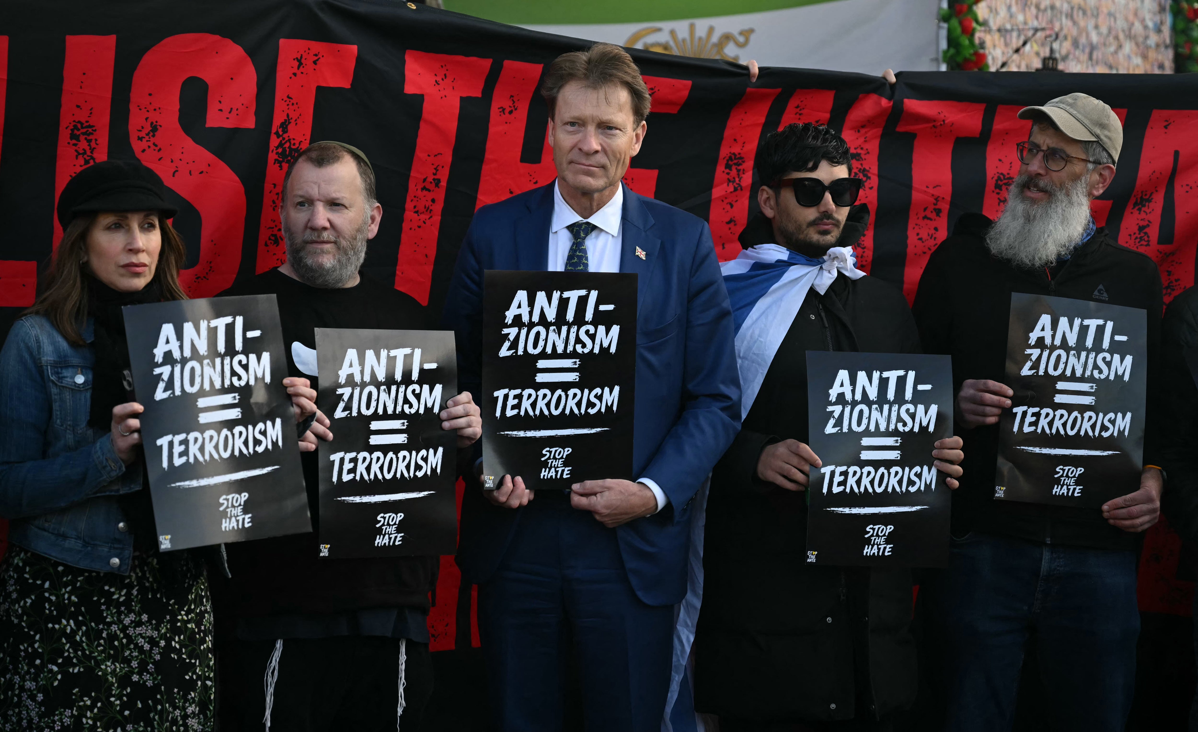 Reform UK deputy leader Richard Tice takes part in an anti-hate protest