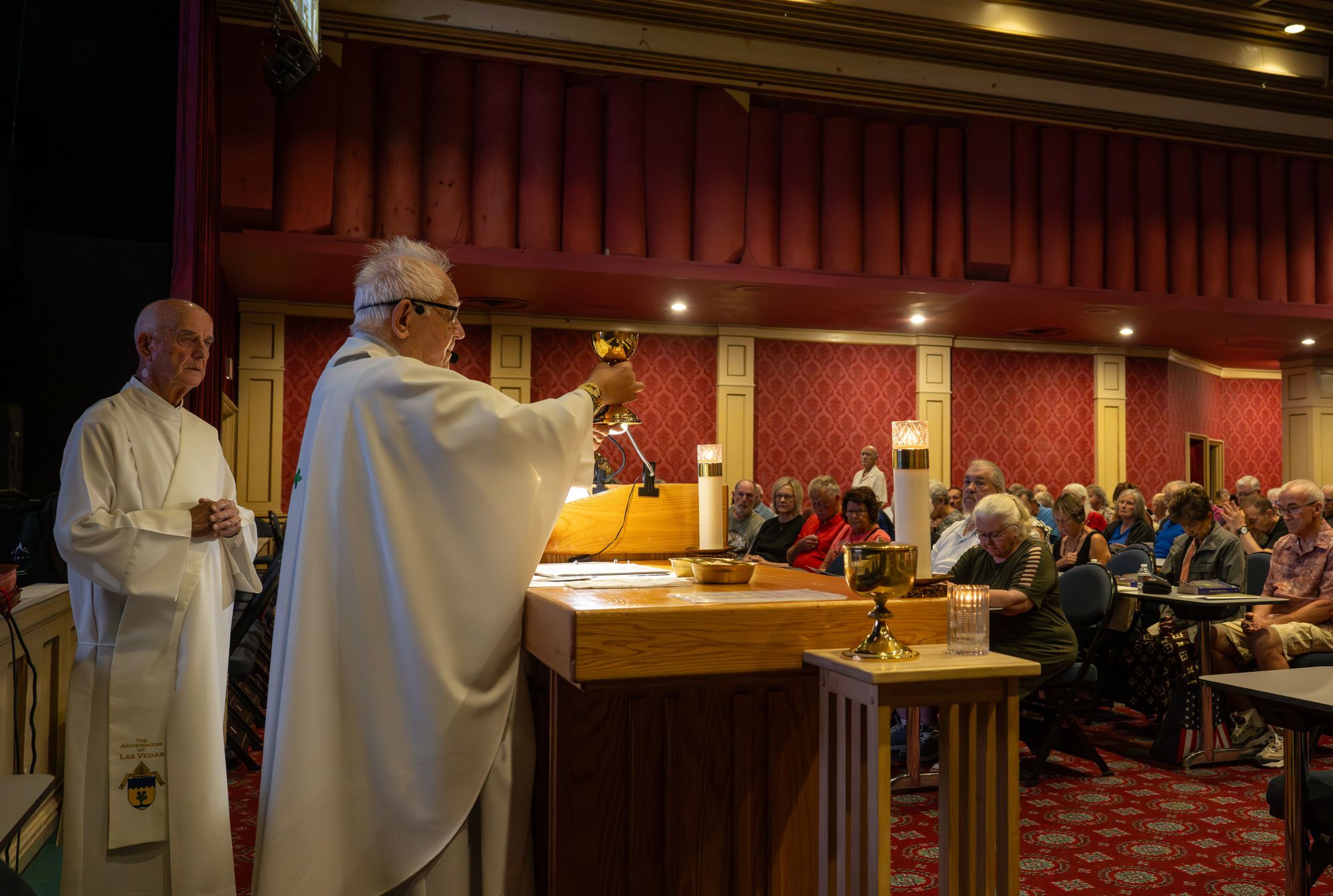 Father Charlie Urnick is known for leading Mass with a lively sense of humor, which some out-of-town worshippers also follow through the services’ livestreams