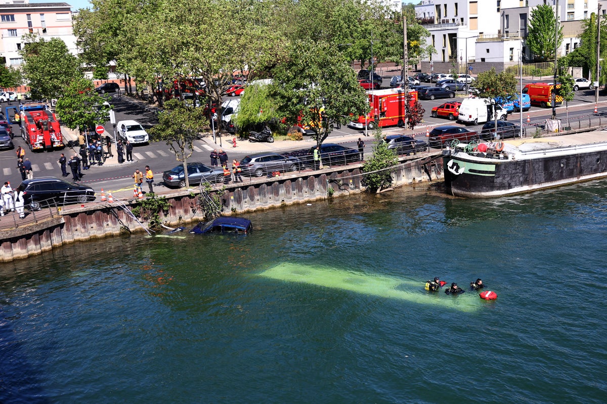 Bus sinks into the River Seine near Paris after nightmare lesson for trainee driver
