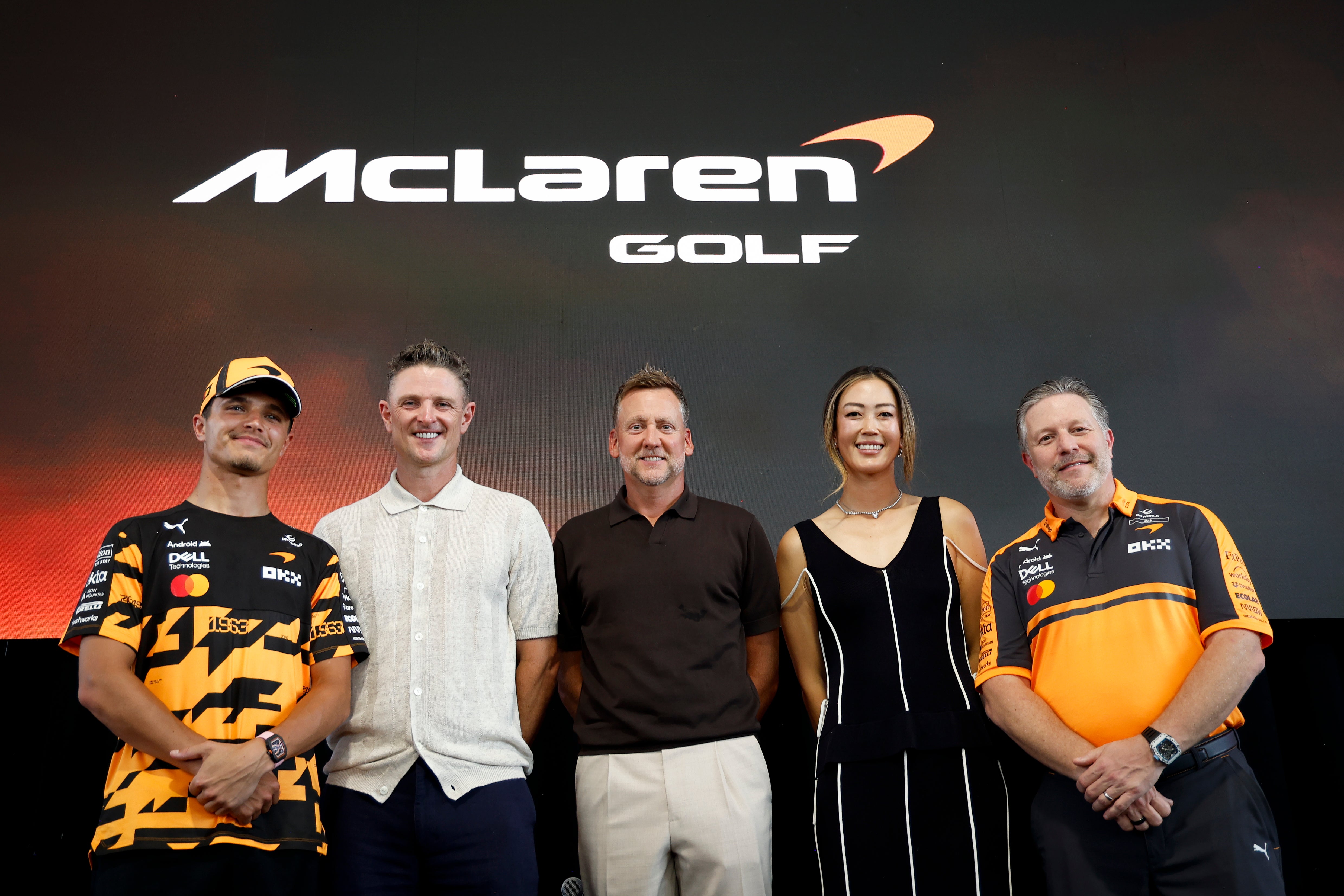 Lando Norris (far-left) poses with Justin Rose (centre-left), Ian Poulter (centre), Michelle Wie (centre-right) and Zak Brown at McLaren's golf launch event on Wednesday