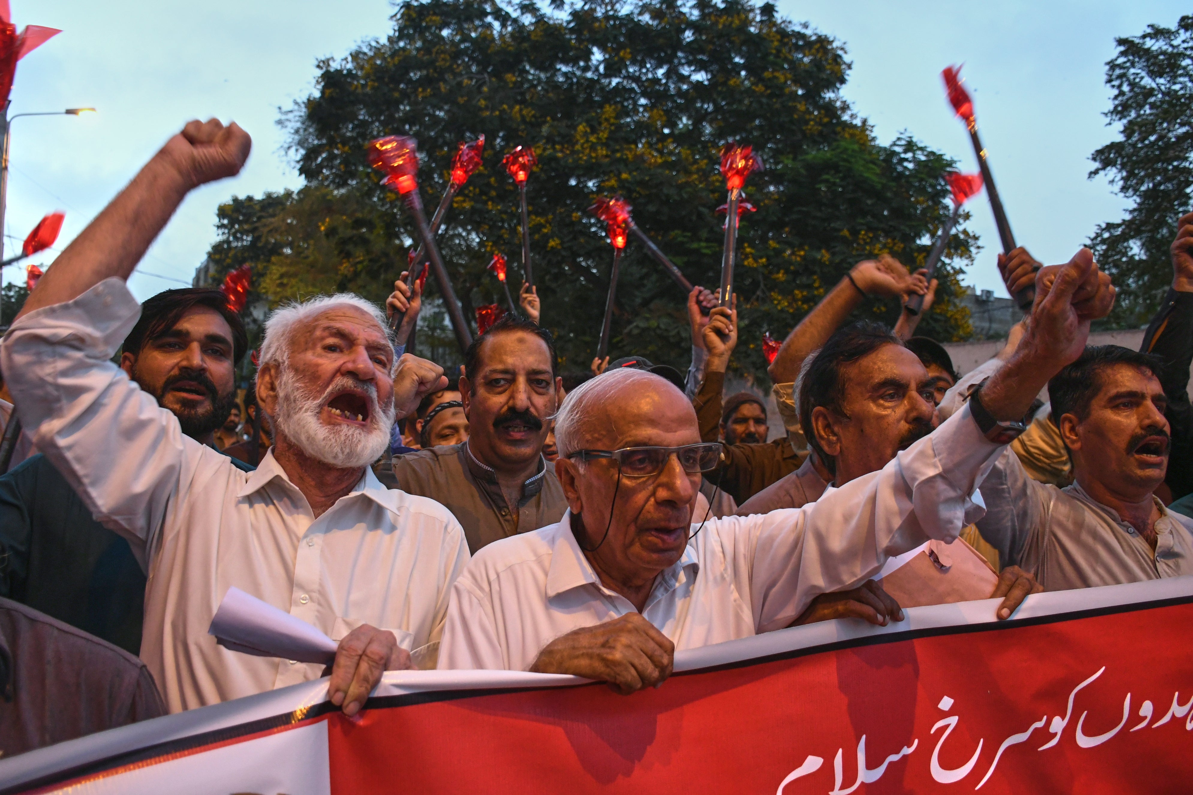 Members of trade unions take part in a rally a day ahead of the International Labor Day, in Karachi, Pakistan.