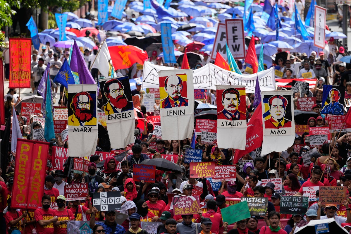 Workers around the world demonstrate on May Day, in photos