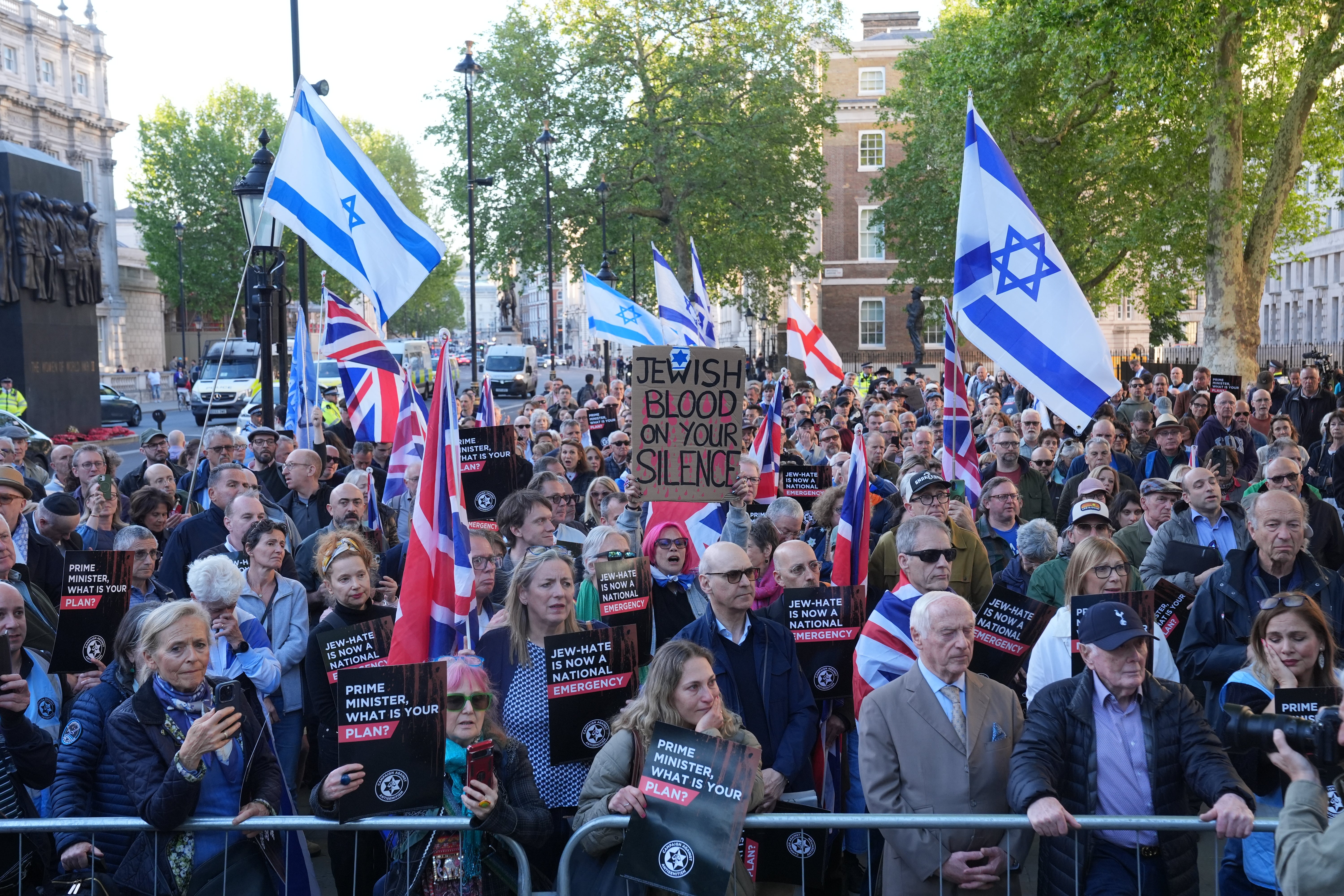 People attend a Campaign Against Antisemitism 'national emergency' rally in Whitehall, central London, following two people being stabbed in Golders Green, north-west London on Wednesday.