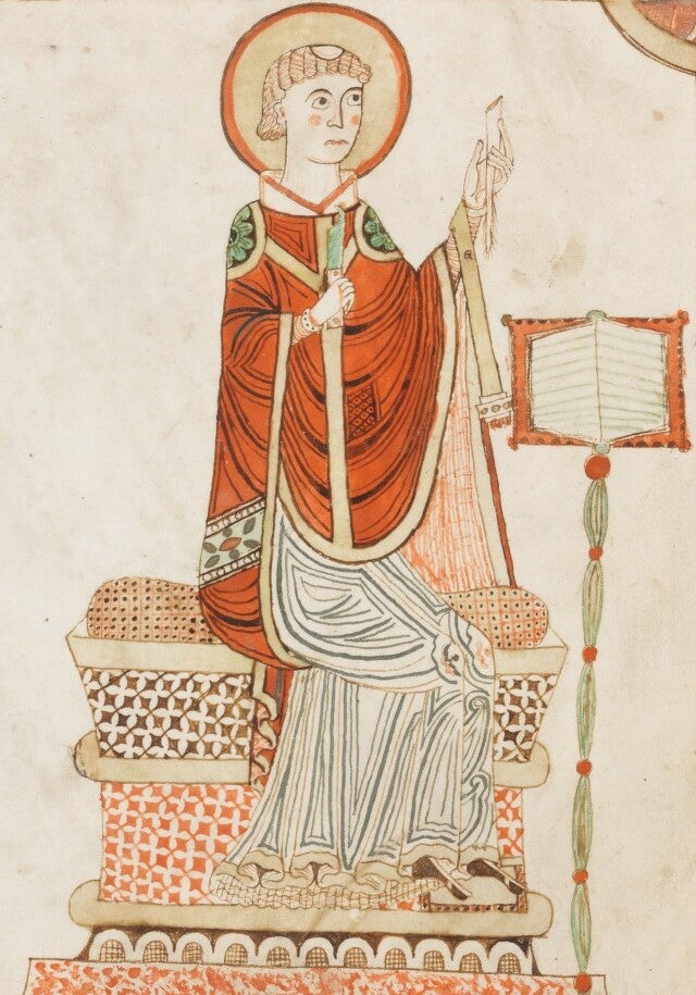 Venerable Bede in an illustrated manuscript, writing his Ecclesiastical History of the English People.