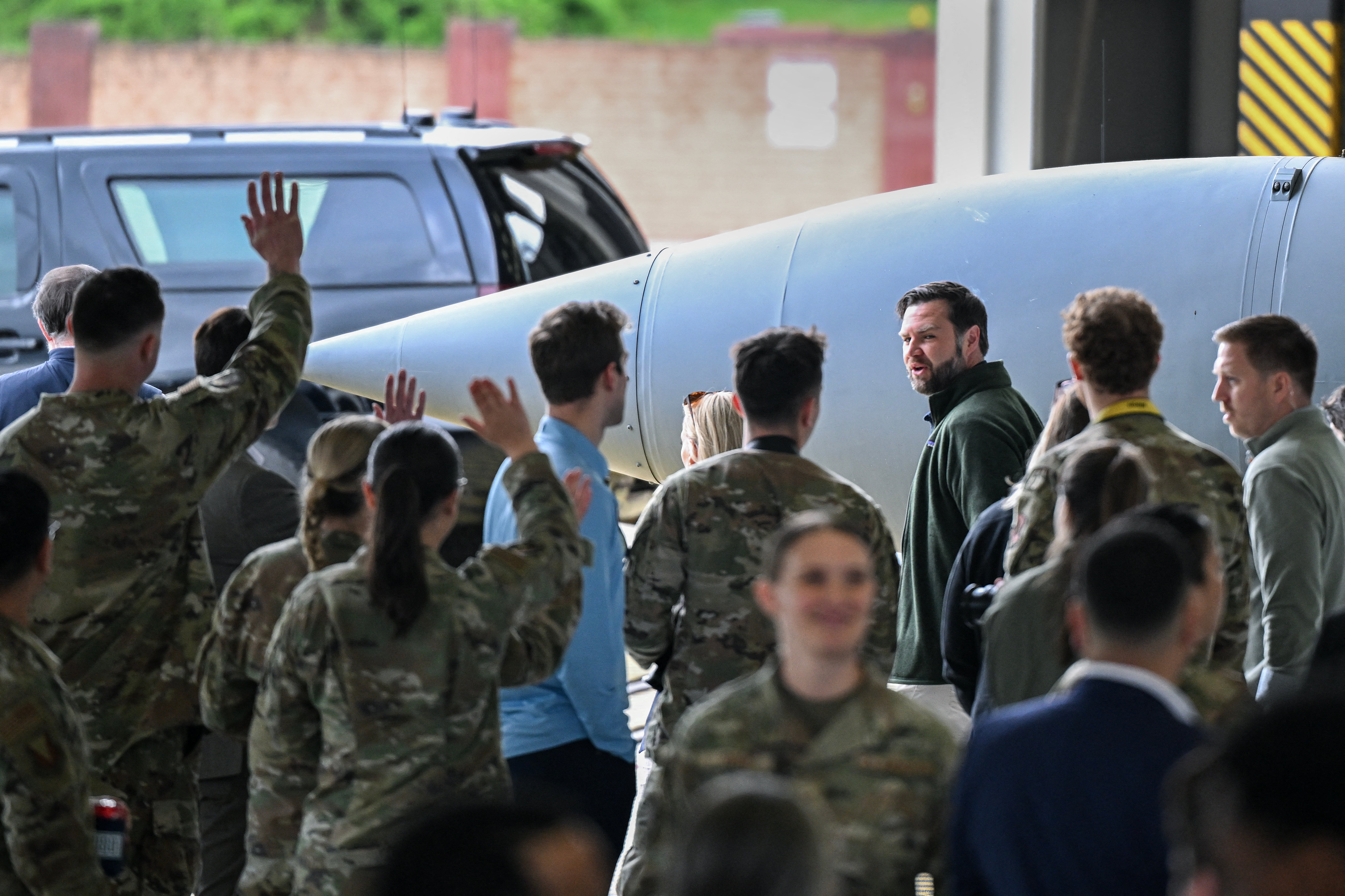 US Vice President JD Vance visits US military members during a refueling stop at Ramstein Air Base en route to Joint Base Andrews, Maryland in April 2025