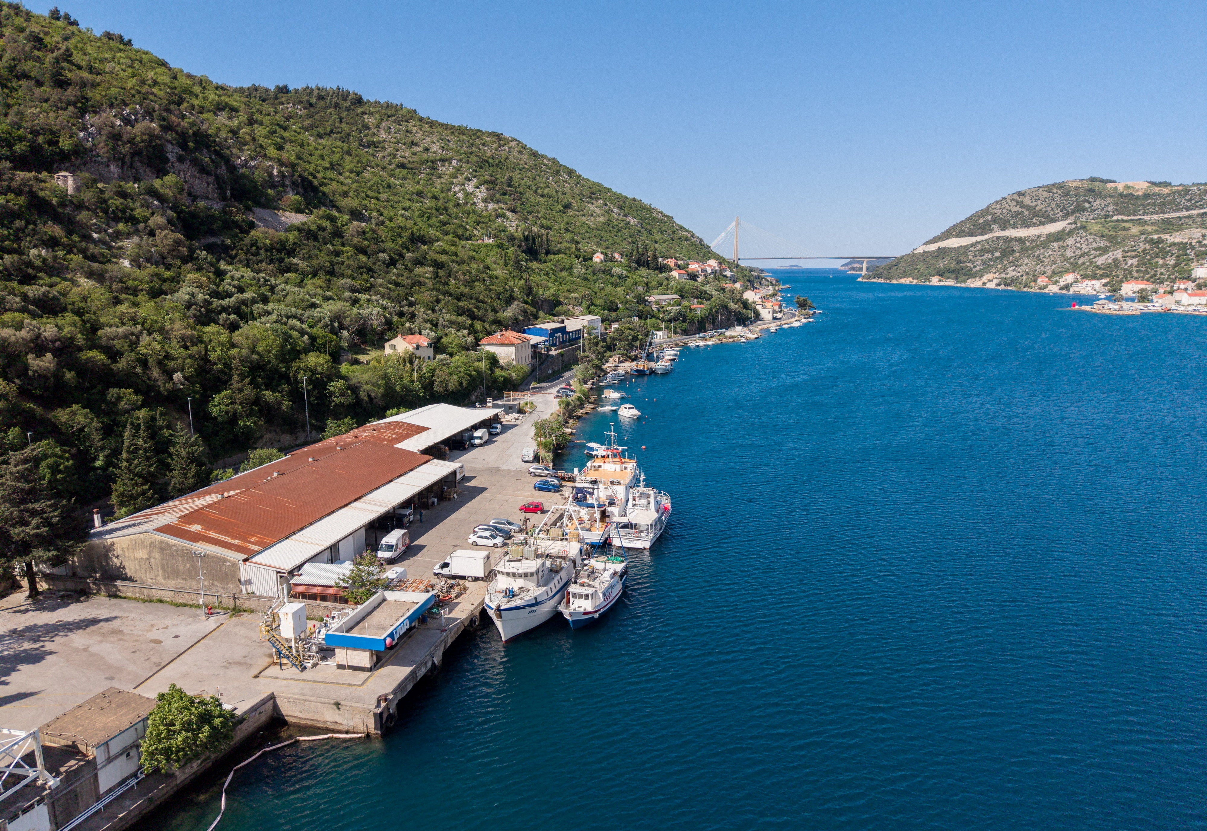 A drone view shows fishing and other boats at the port Sustjepan in Dubrovnik, Croatia