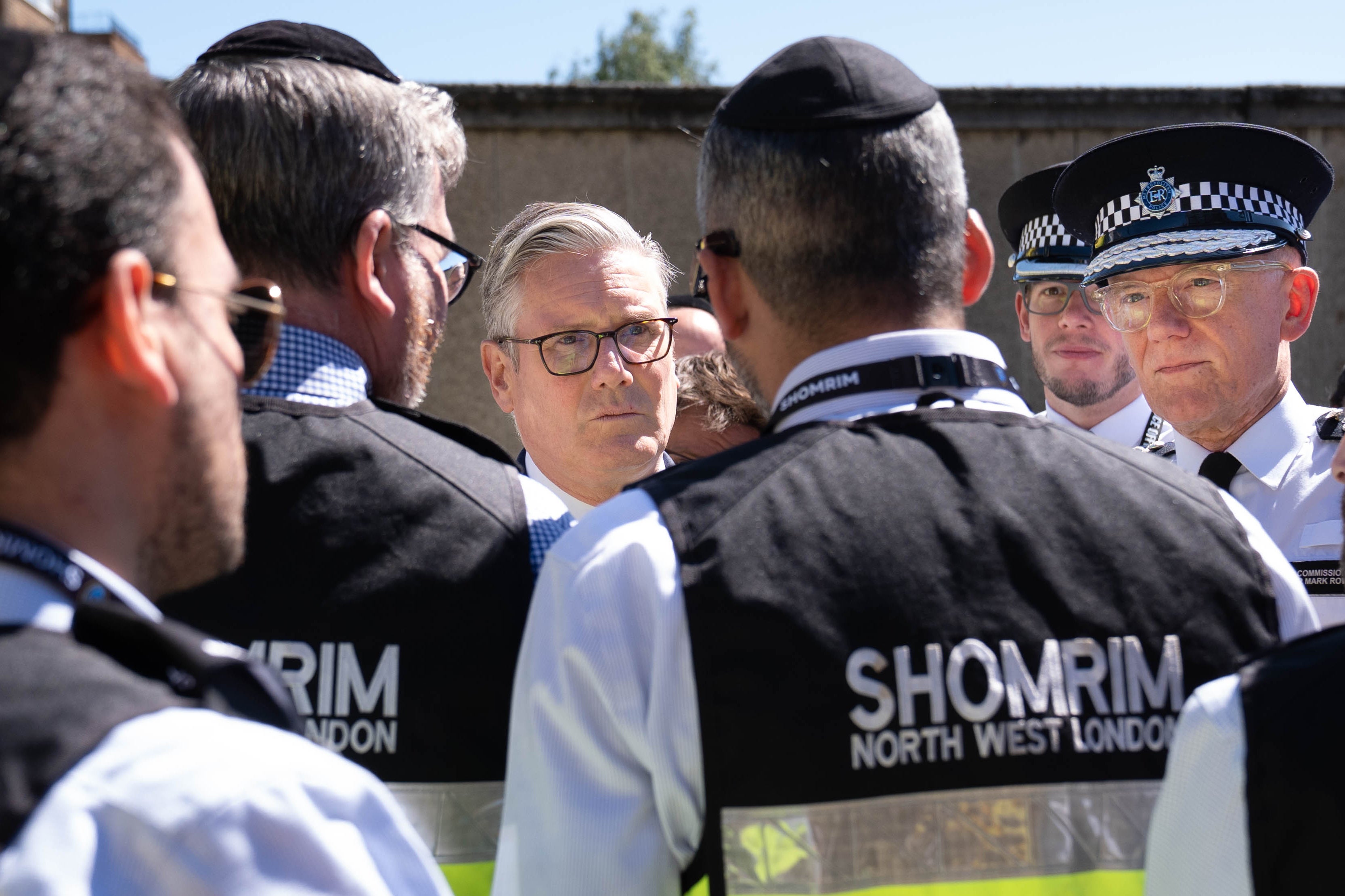 Prime Minister Sir Keir Starmer and Metropolitan Police Commissioner Sir Mark Rowley meet first responders from Shomrim North West London during a visit to Golders Green (Stefan Rousseau/PA)