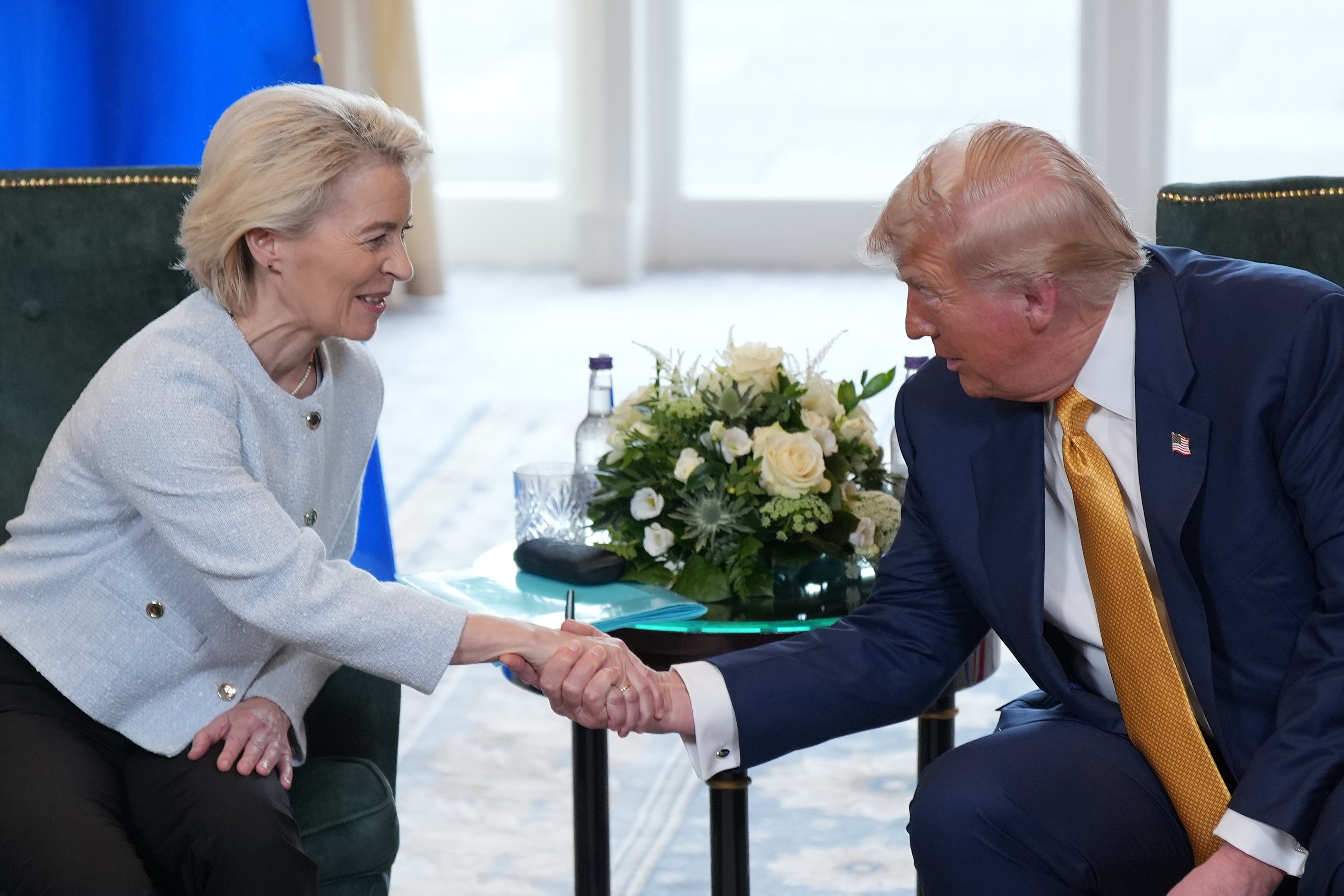 President of the European Commission Ursula von der Leyen shakes hands with U.S. President Donald Trump during a meeting at Trump Turnberry golf club on July 27, 2025 in Turnberry, Scotland