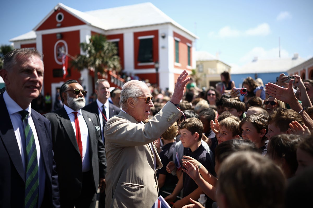 Hundreds of school children and islanders welcome the King to Bermuda