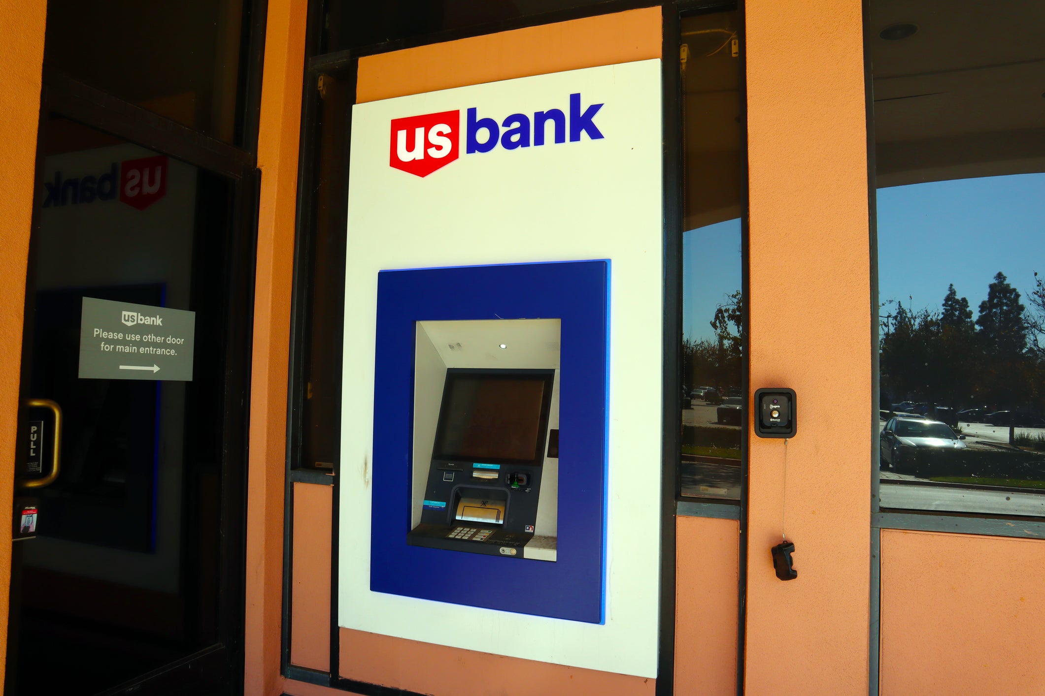 The suspect is accused of entering a branch of U.S. Bank just before 2 p.m. and shooting and killing two employees
