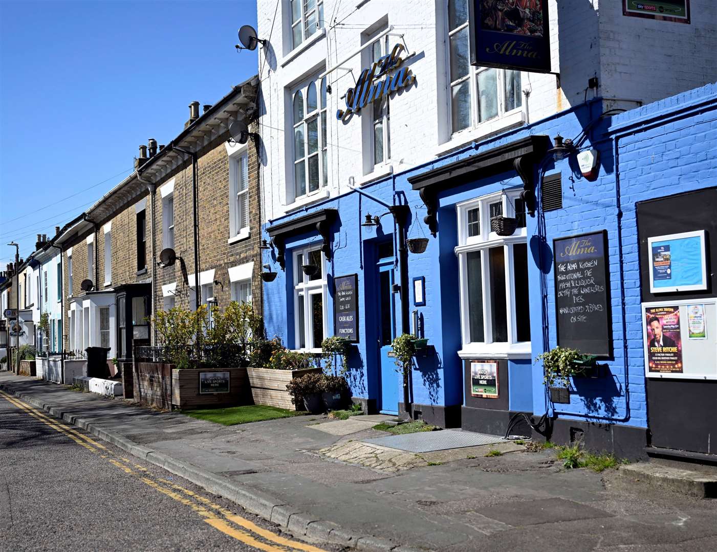 The Alma pub in West Street, just a few houses away from Ms Kenny's property, is painted the same colour