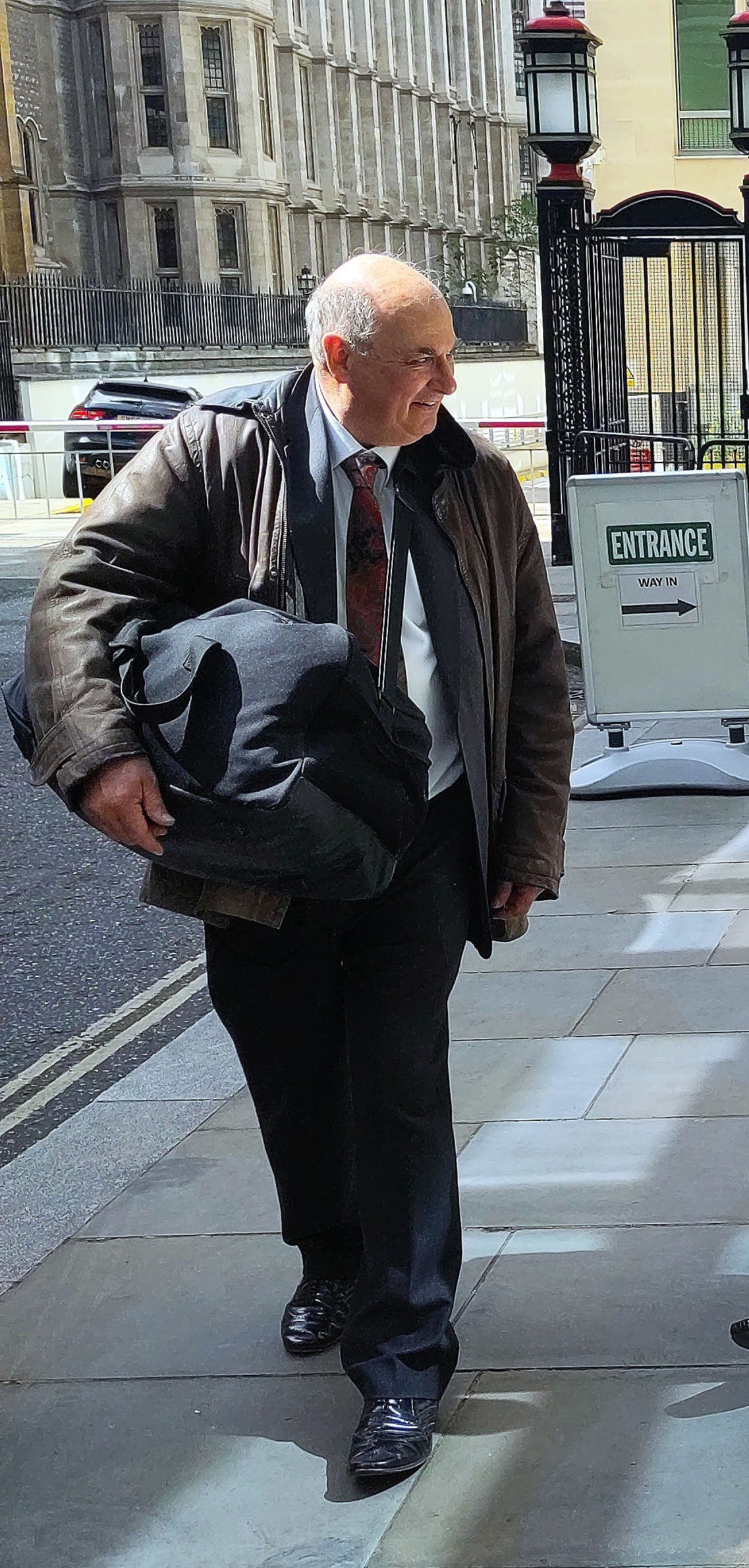 David Bowerman, a bespoke clock and furniture maker, outside court