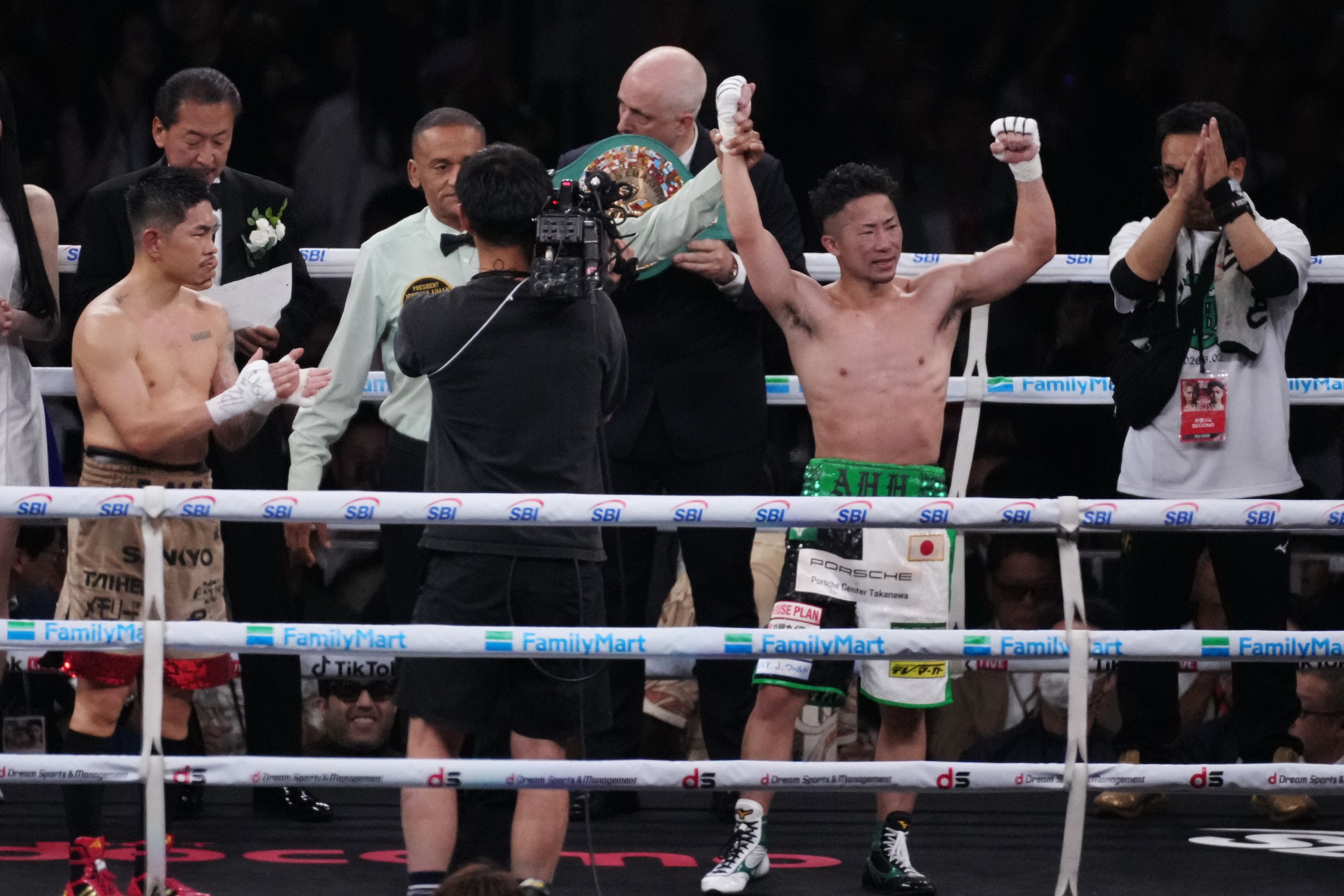 Takuma Inoue sees his hand raised