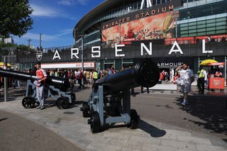 Arsenal fans arrive at the Emirates