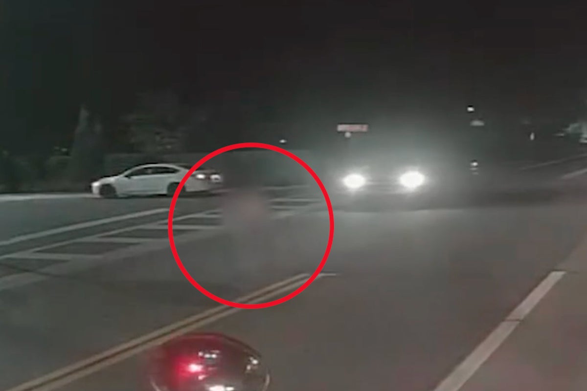 Car misses child by inches as it illegally passes parked school bus