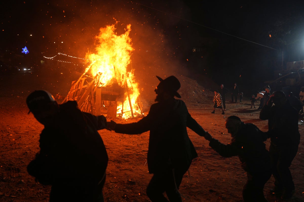 Jewish holiday Lag BaOmer lights up Israel with bonfires and song, in photos