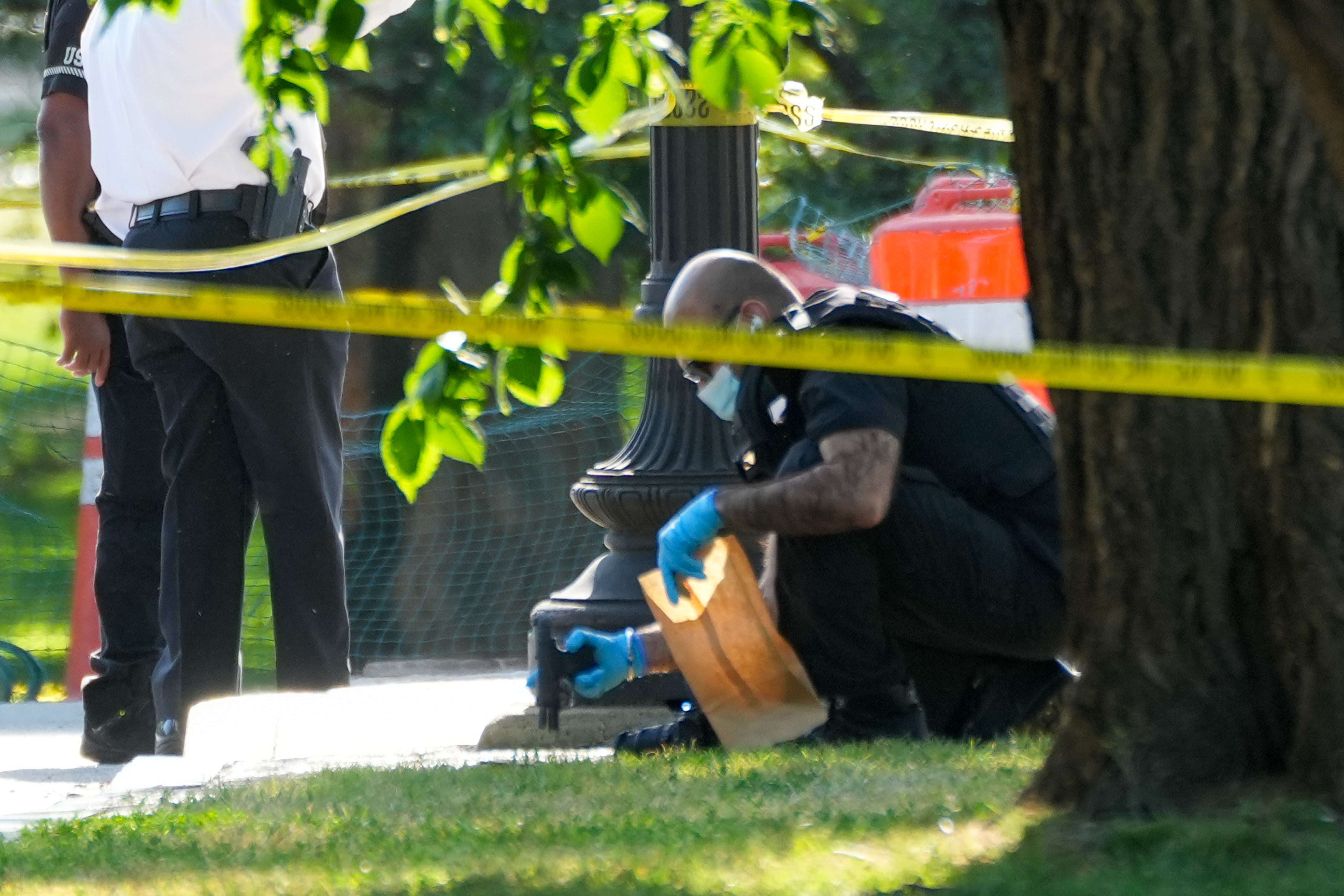 The suspect was taken to a local hospital and said to be conscious and breathing