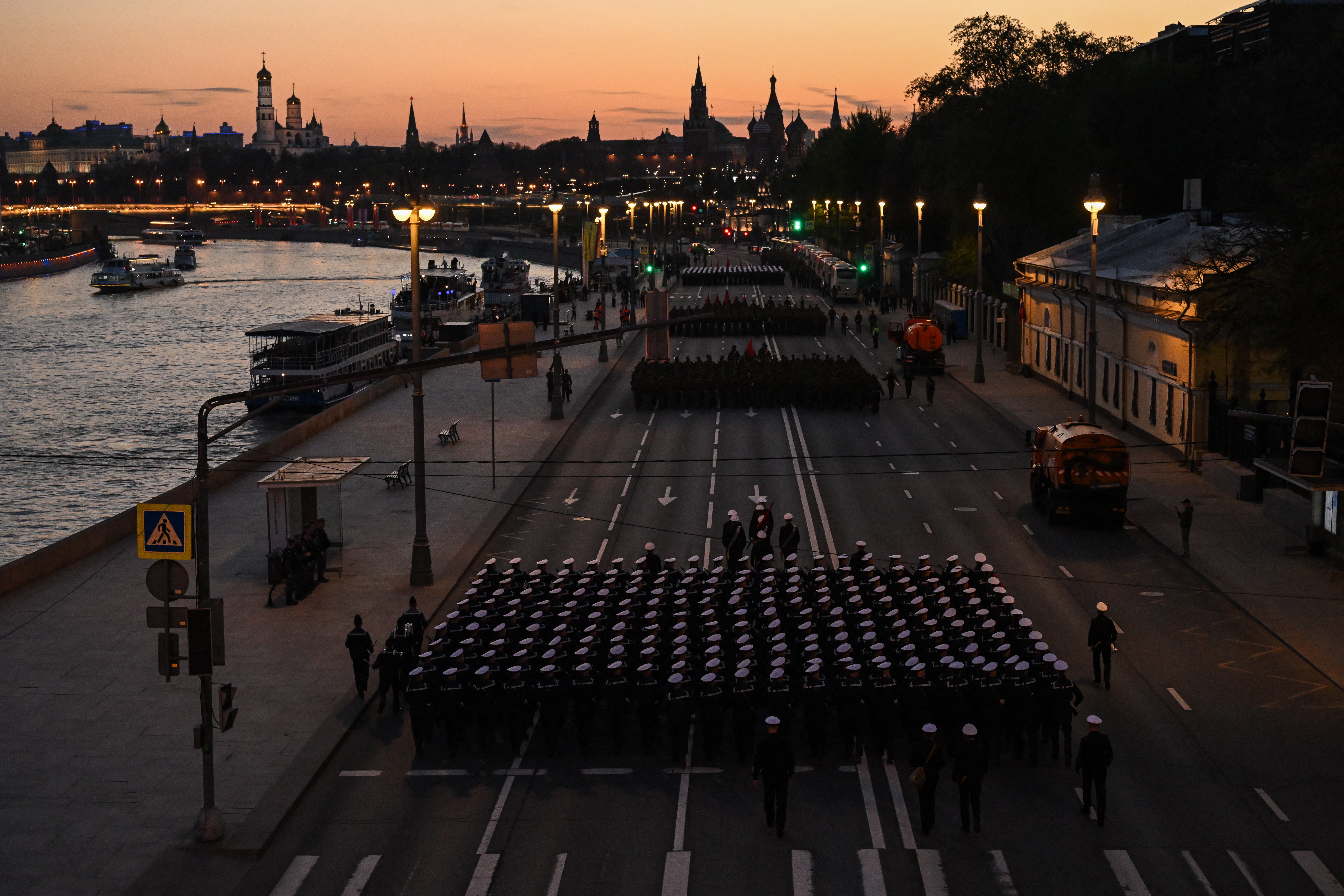 Russian servicemen march towards Red Square for the rehearsal of the Victory Day military parade in central Moscow