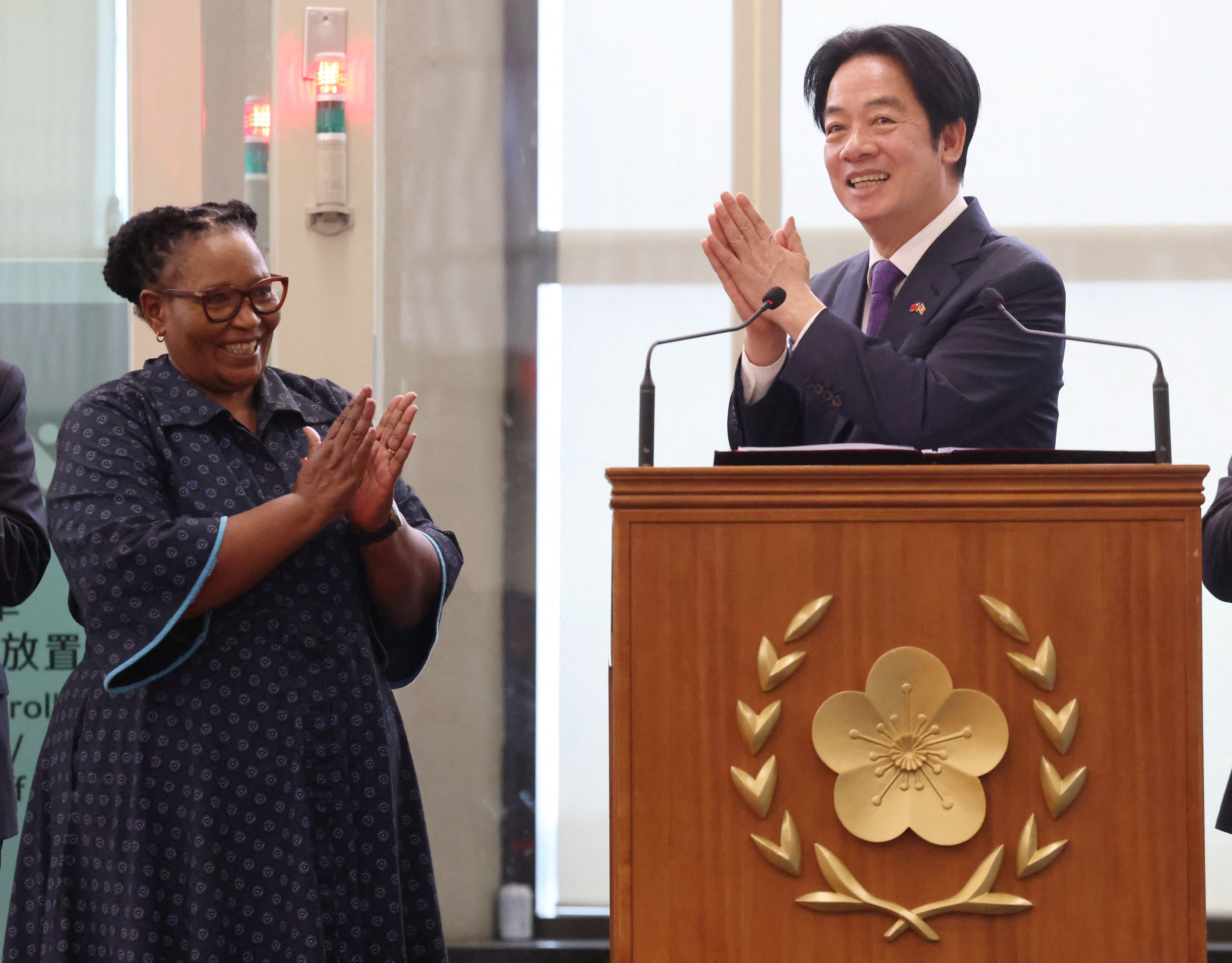 Lai Ching-te and Eswatini deputy prime minister Thulisile Dladla arrive at Taiwan Taoyuan International Airport following his visit to Eswatini
