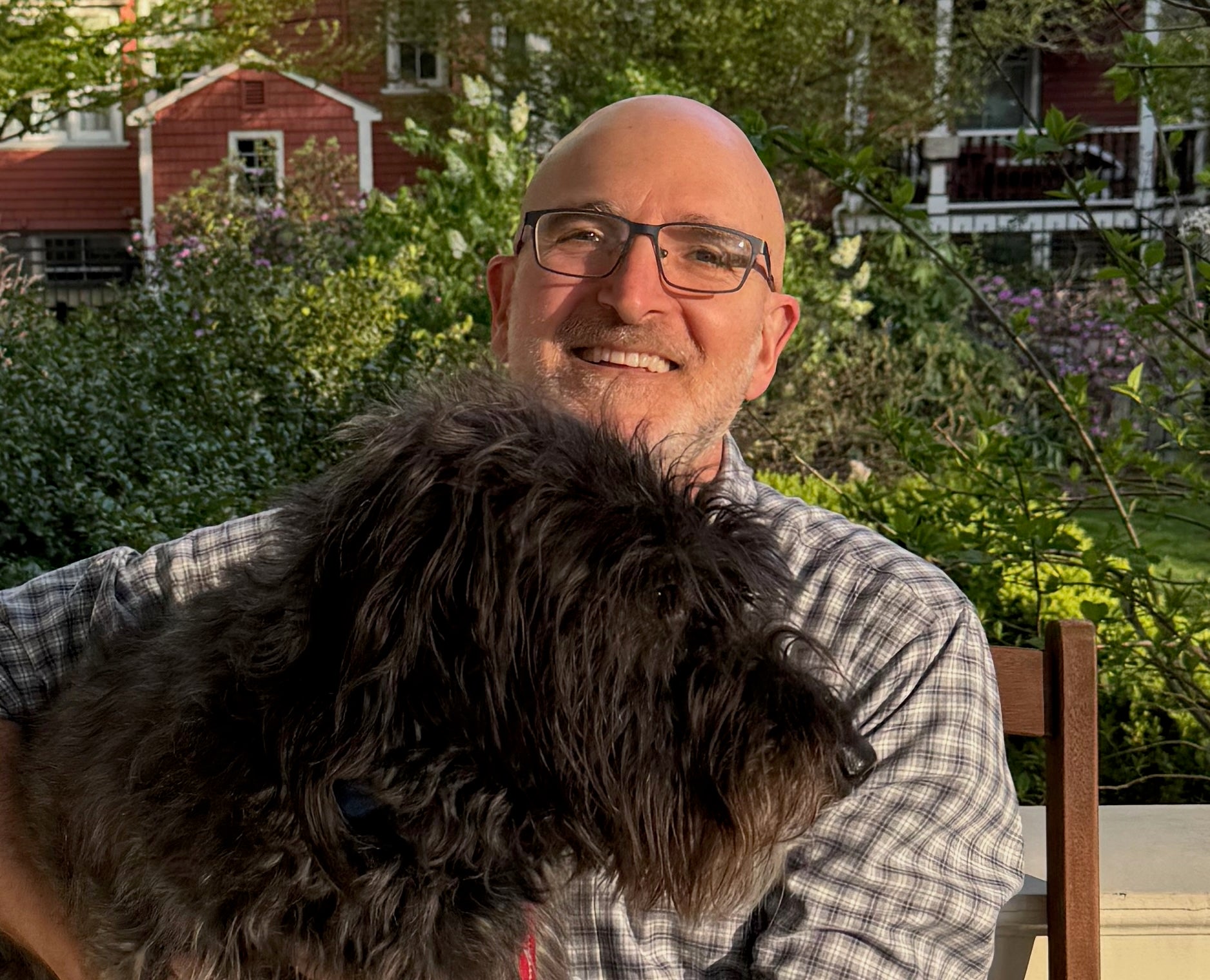 Daniel Promislow with Pete, a half Curly-coated retriever and half Beagle