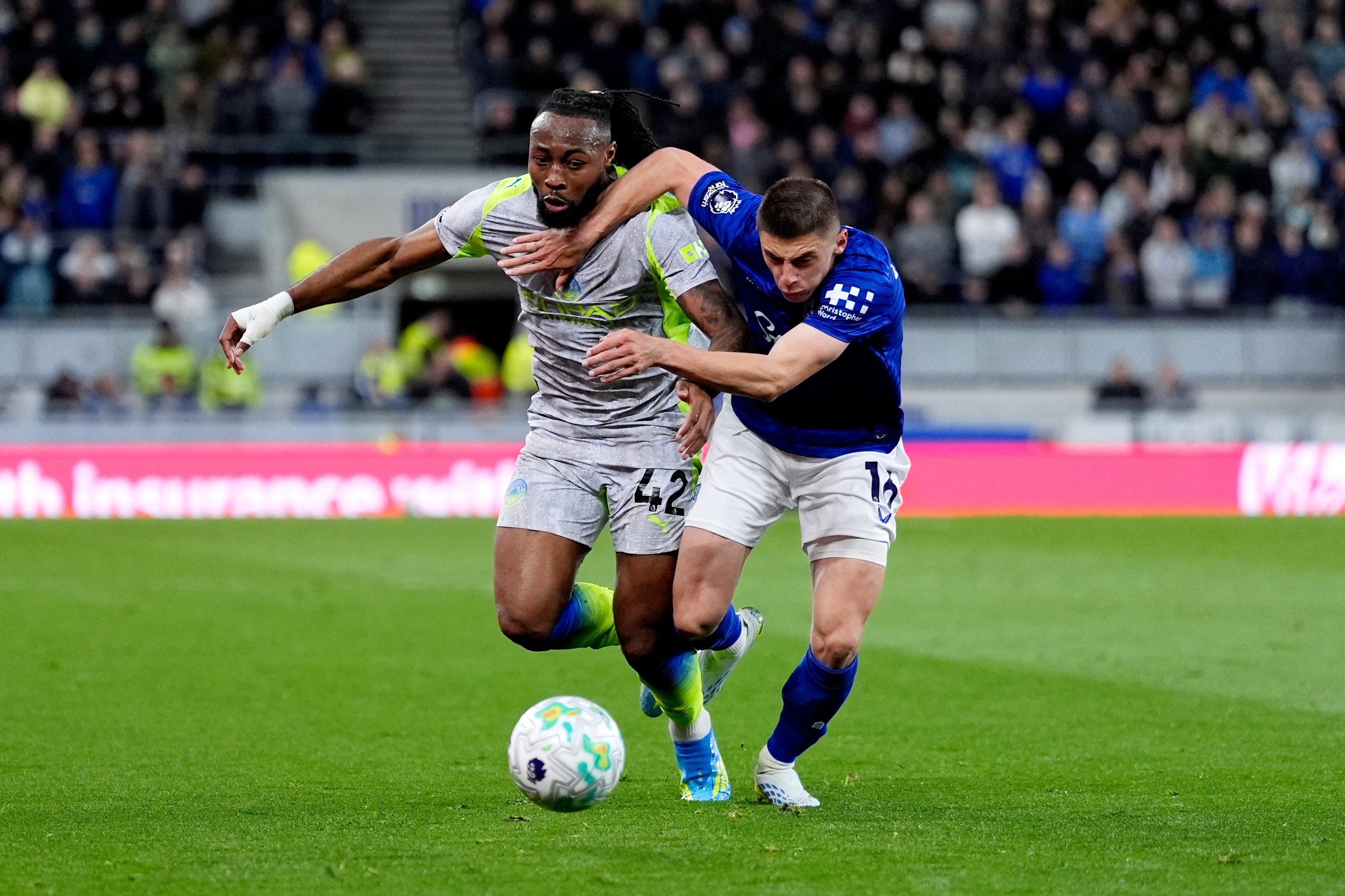 City’s Antoine Semenyo (left) competes with Everton’s Vitaliy Mykolenko for the ball